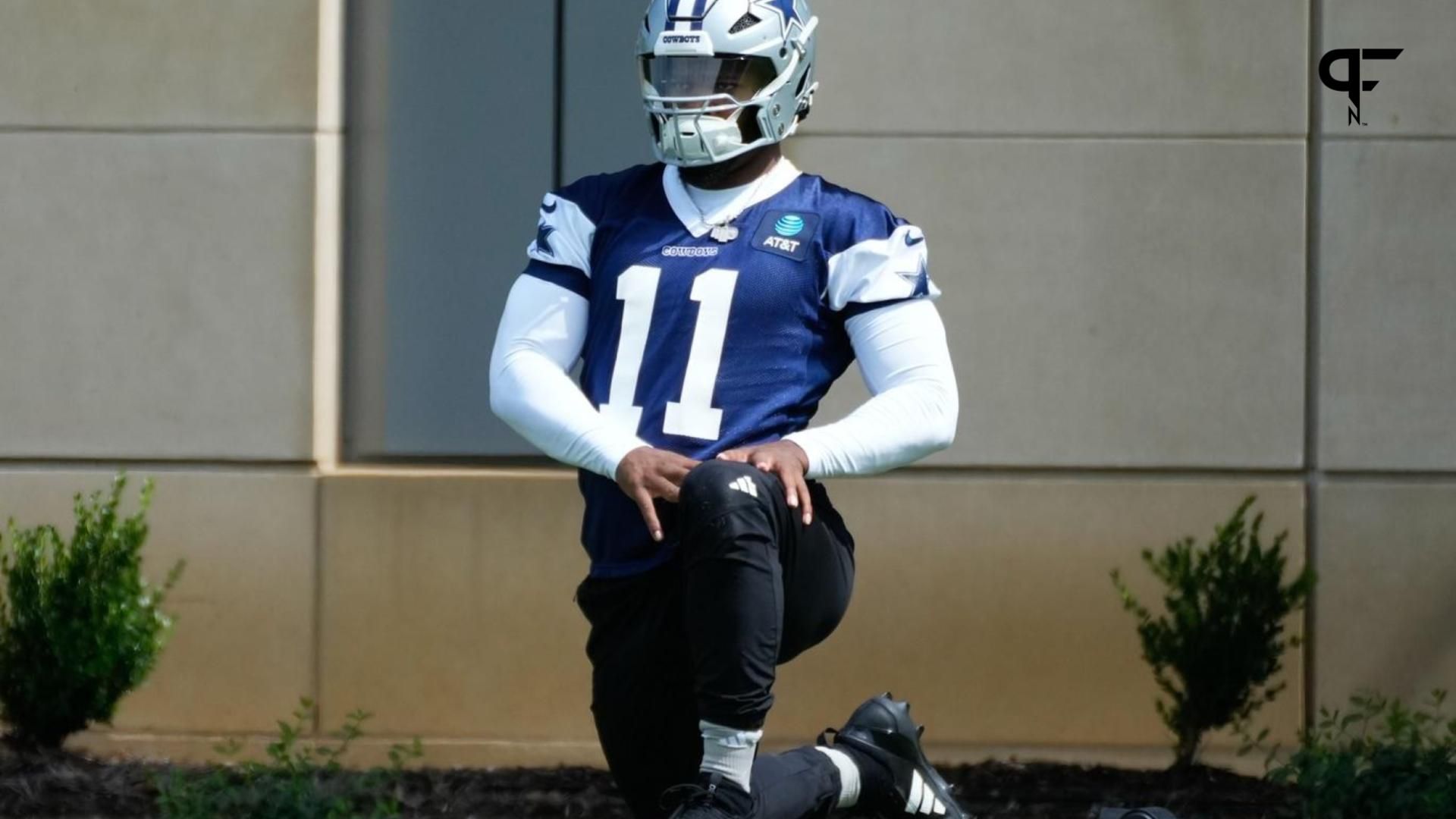 Dallas Cowboys LB Micah Parsons (11) warms up before practice.