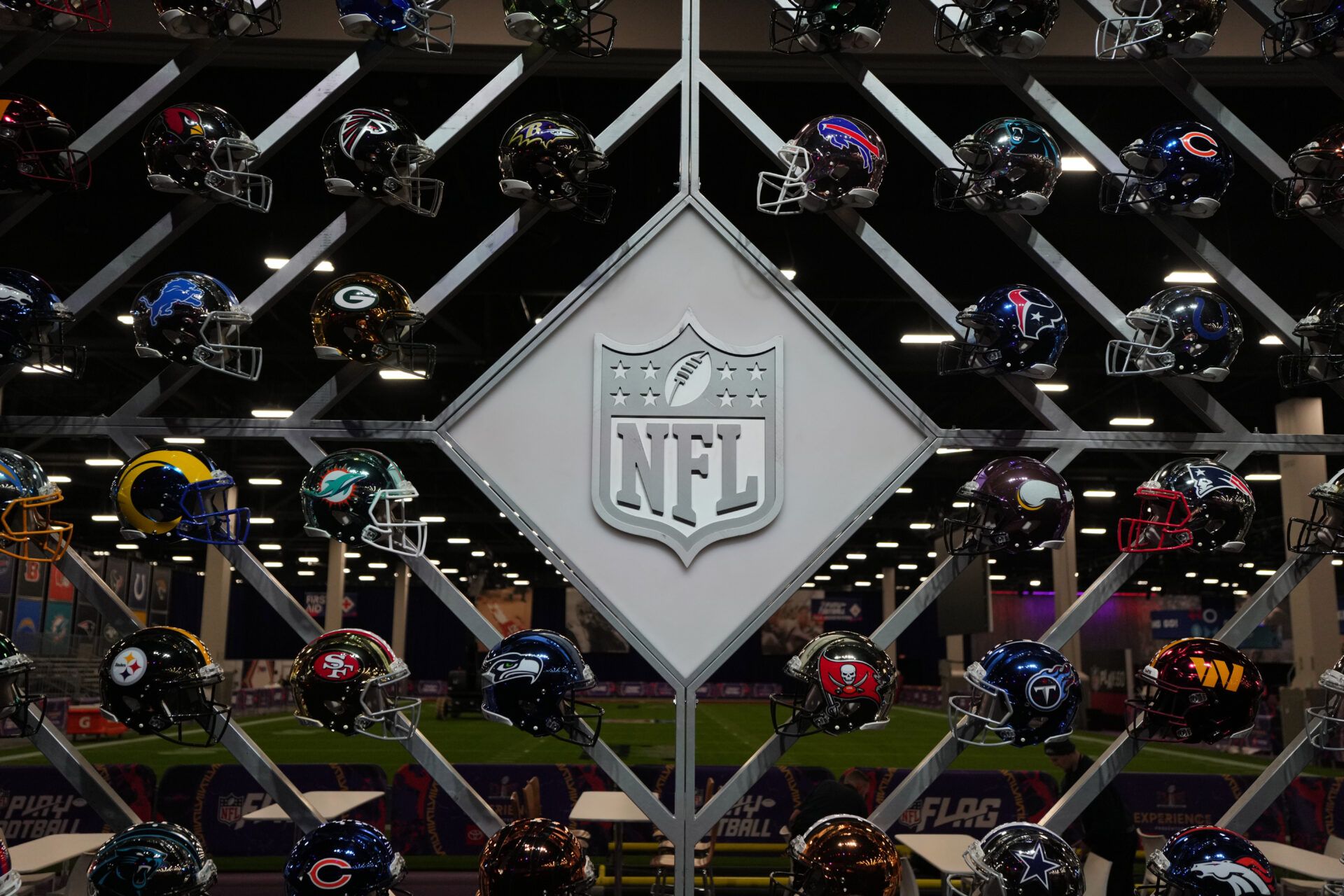 Feb 6, 2024; Las Vegas, NV, USA; The NFL shield logo and helmets at the NFL Experience at the Mandalay Bay resort and casino. Mandatory Credit: Kirby Lee-USA TODAY Sports