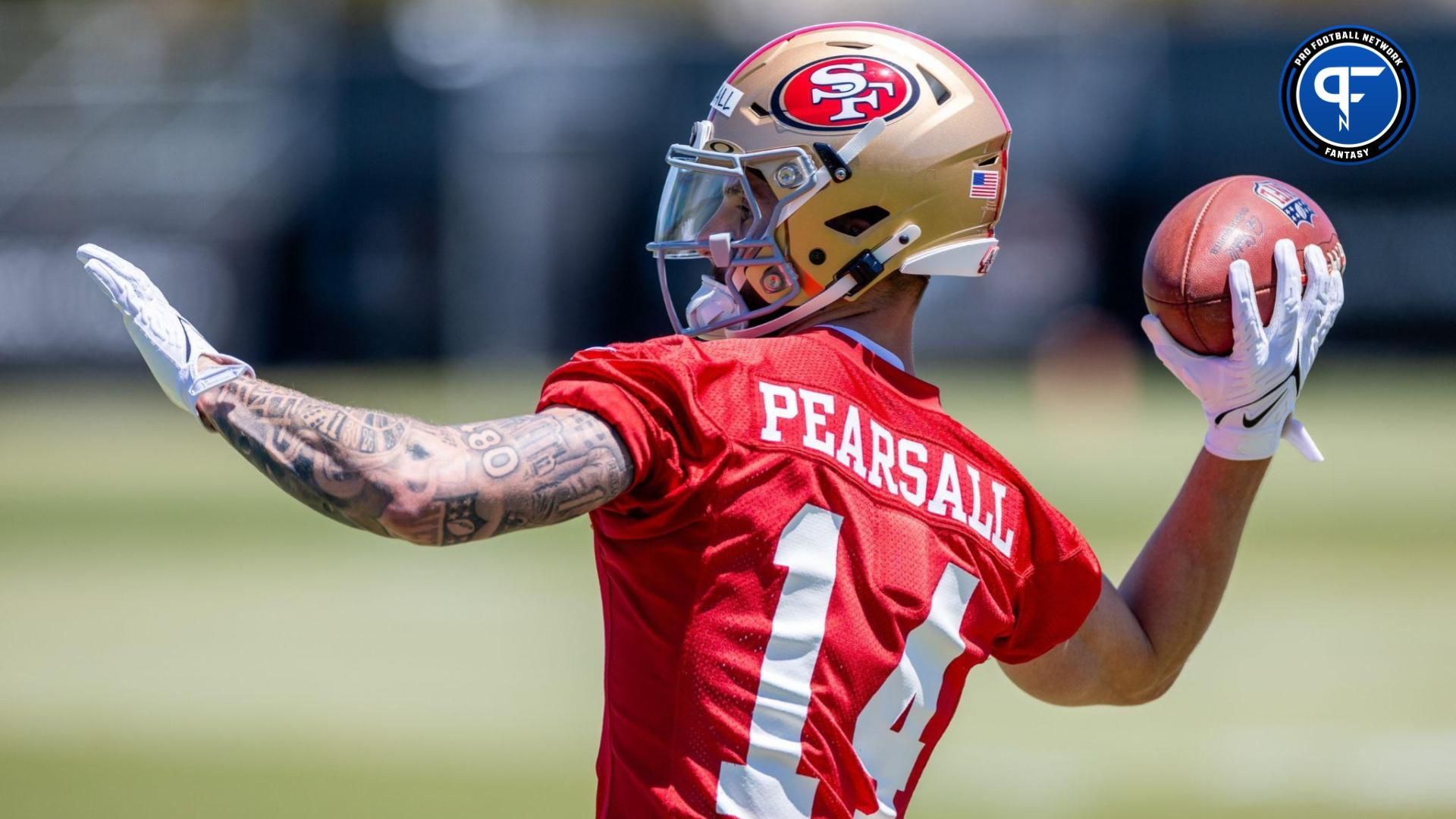 San Francisco 49ers WR Ricky Pearsall (14) throws a pass during rookie minicamp.