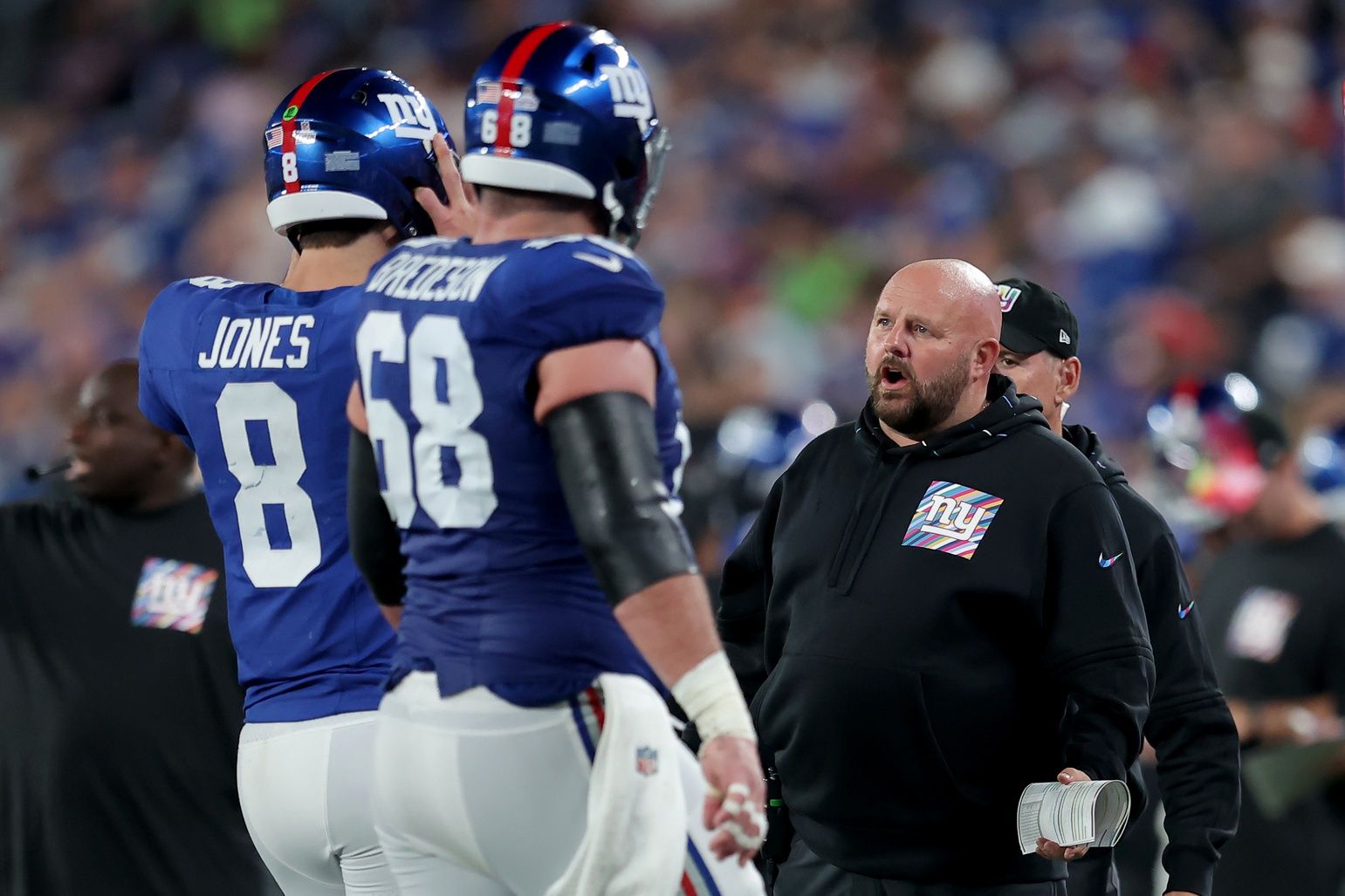 New York Giants head coach Brian Daboll talks to quarterback Daniel Jones (8) as he comes off the field during the second quarter against the Seattle Seahawks at MetLife Stadium. Mandatory Credit: Brad Penner-USA TODAY Sports