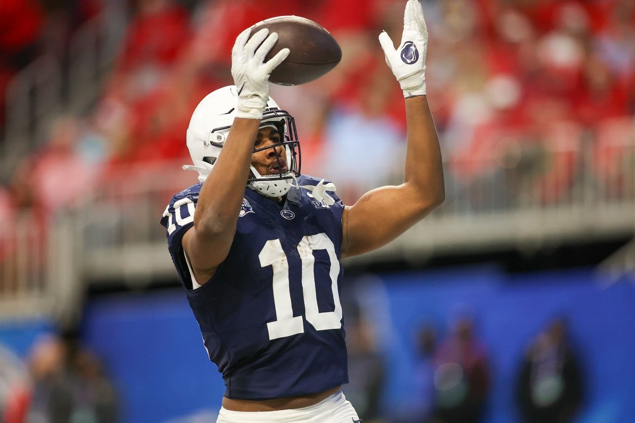 Penn State Nittany Lions running back Nicholas Singleton (10) celebrates after a touchdown against the Mississippi Rebels in the second quarter at Mercedes-Benz Stadium. Mandatory Credit: Brett Davis-USA TODAY Sports