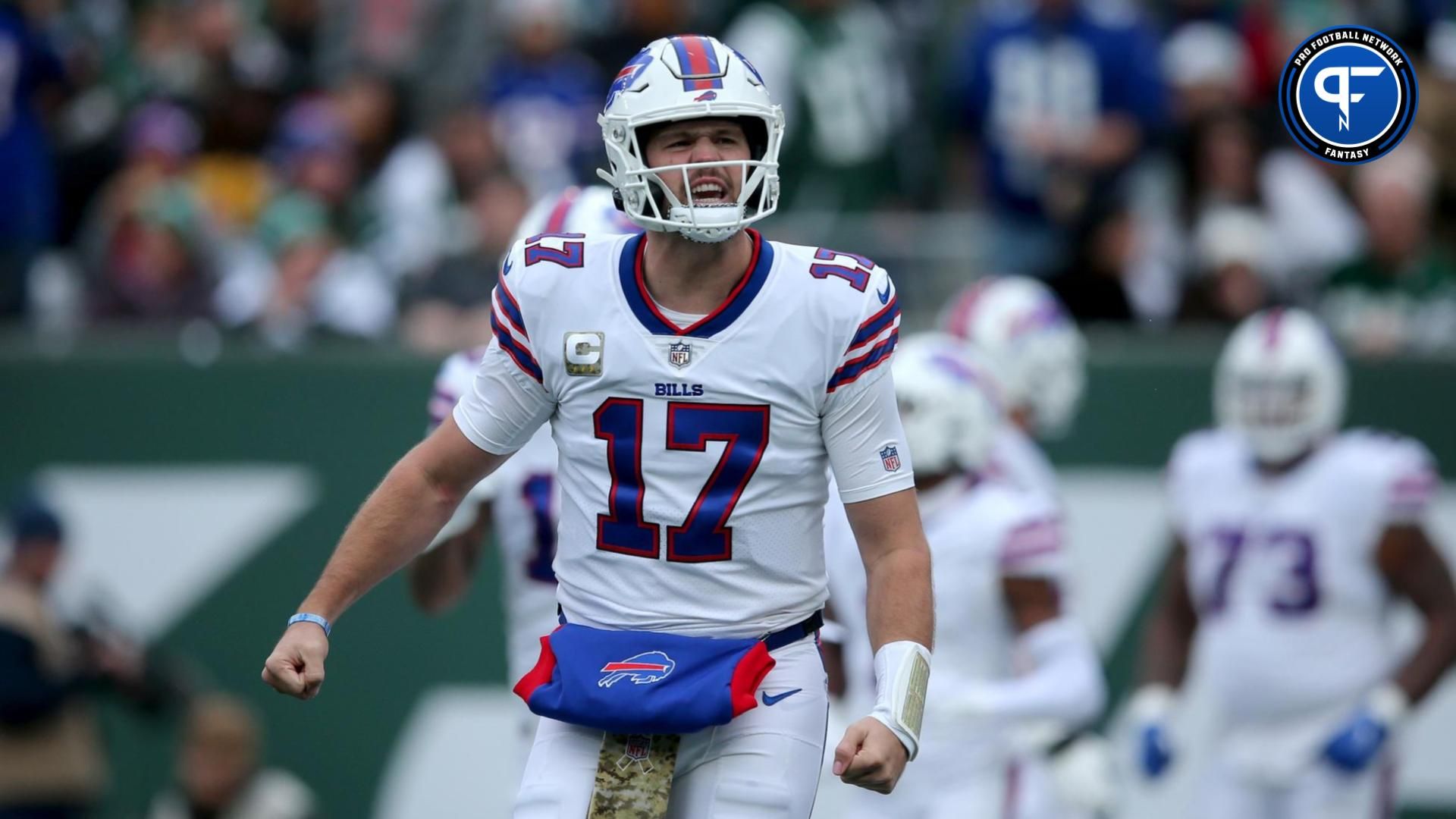 Buffalo Bills quarterback Josh Allen (17) celebrates a touchdown against the New York Jets during the first quarter at MetLife Stadium. Mandatory Credit: Brad Penner-USA TODAY Sports