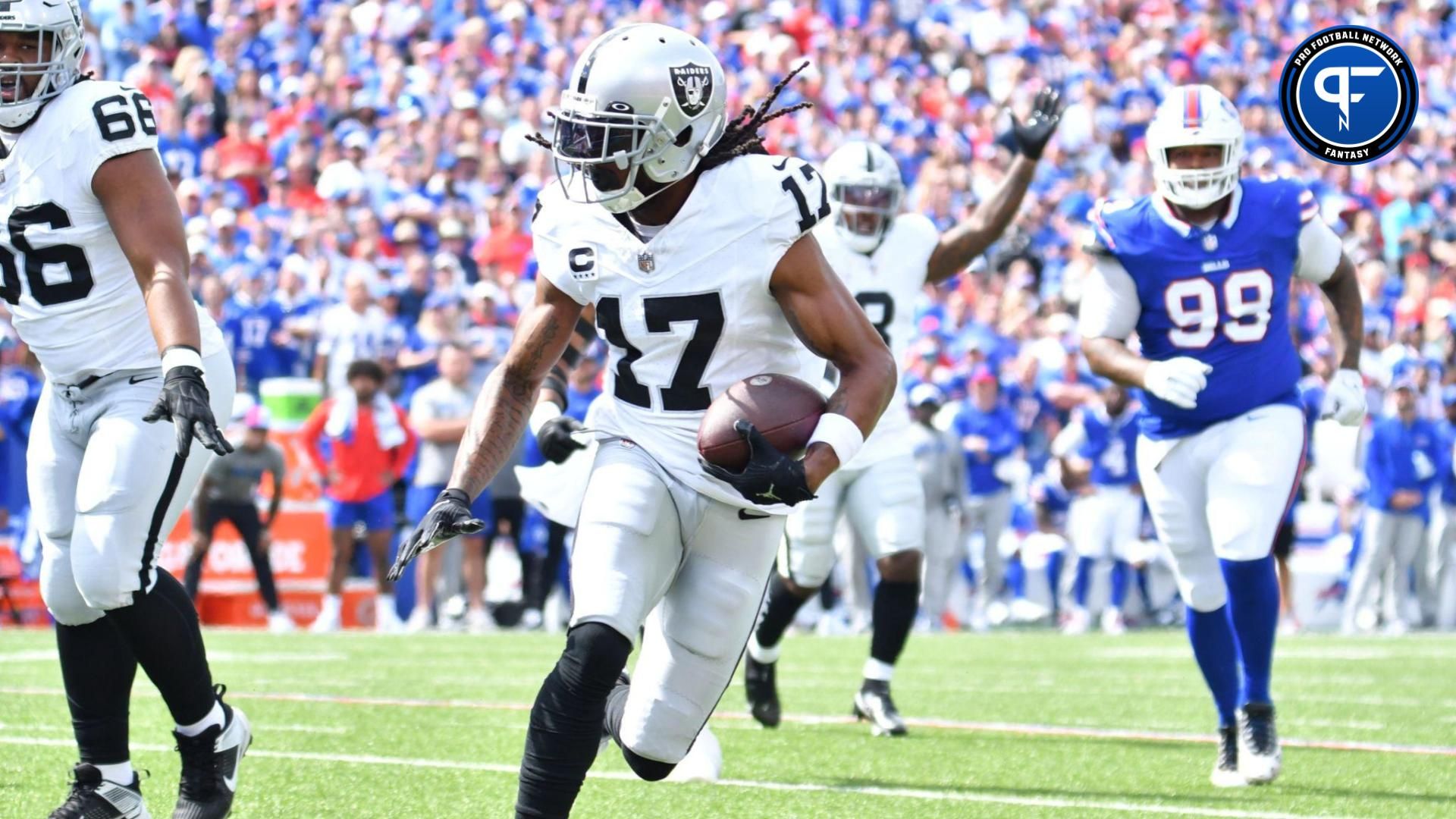 Las Vegas Raiders wide receiver Davante Adams (17) runs for the end zone to score a touchdown in the first quarter against the Buffalo Bills at Highmark Stadium. Mandatory Credit: Mark Konezny-USA TODAY Sports