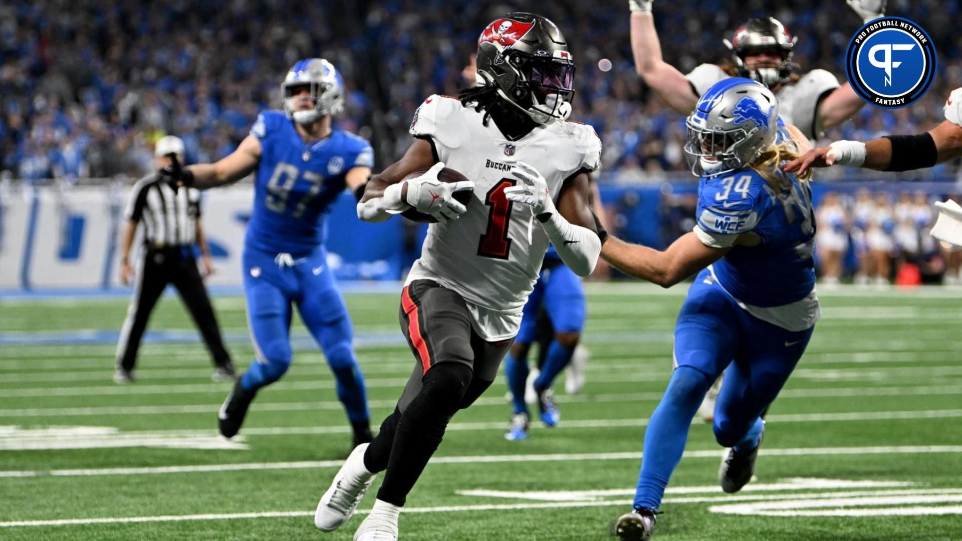 Tampa Bay Buccaneers RB Rachaad White (1) runs in for a touchdown against the Detroit Lions.