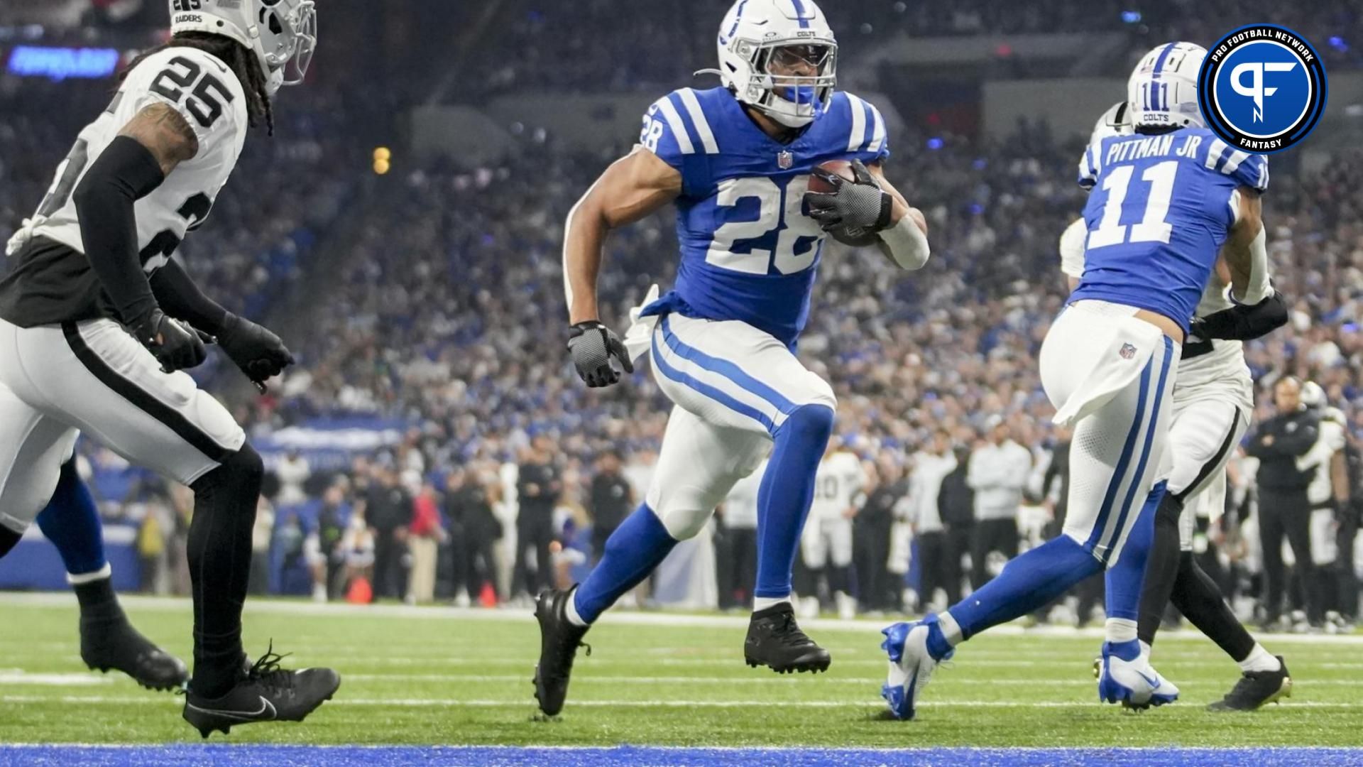 Indianapolis Colts RB Jonathan Taylor (28) runs in for a touchdown against the Las Vegas Raiders.