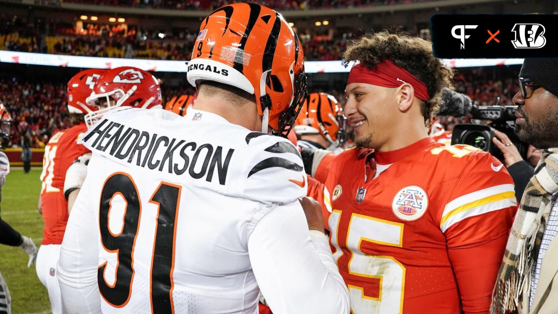 Kansas City Chiefs quarterback Patrick Mahomes (15) talks with Cincinnati Bengals defensive end Trey Hendrickson (91) after the game at GEHA Field at Arrowhead Stadium.