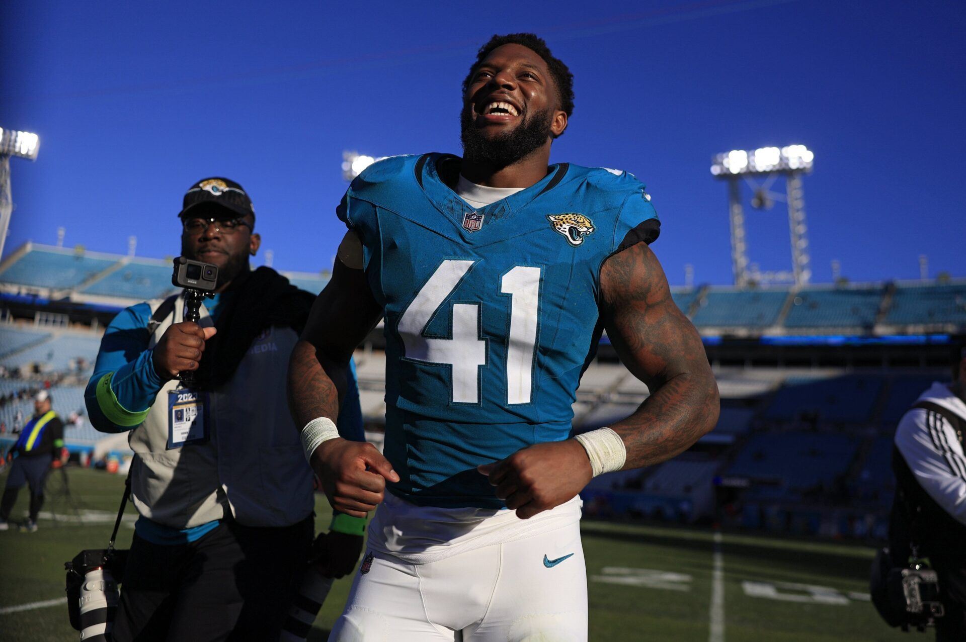 Jacksonville Jaguars linebacker Josh Allen runs off the field after a game at EverBank Stadium. He now goes by Joshua Hines-Allen.