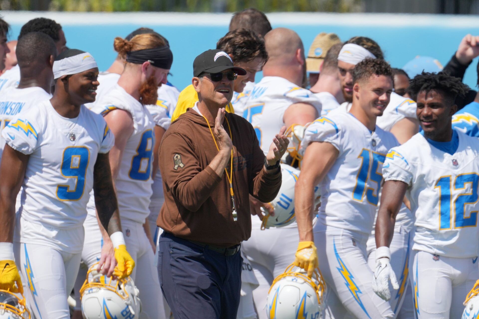 Los Angeles Chargers head coach Jim Harbaugh interacts with his team during minicamp at the Hoag Performance Center. Mandatory Credit: Kirby Lee-USA TODAY Sports