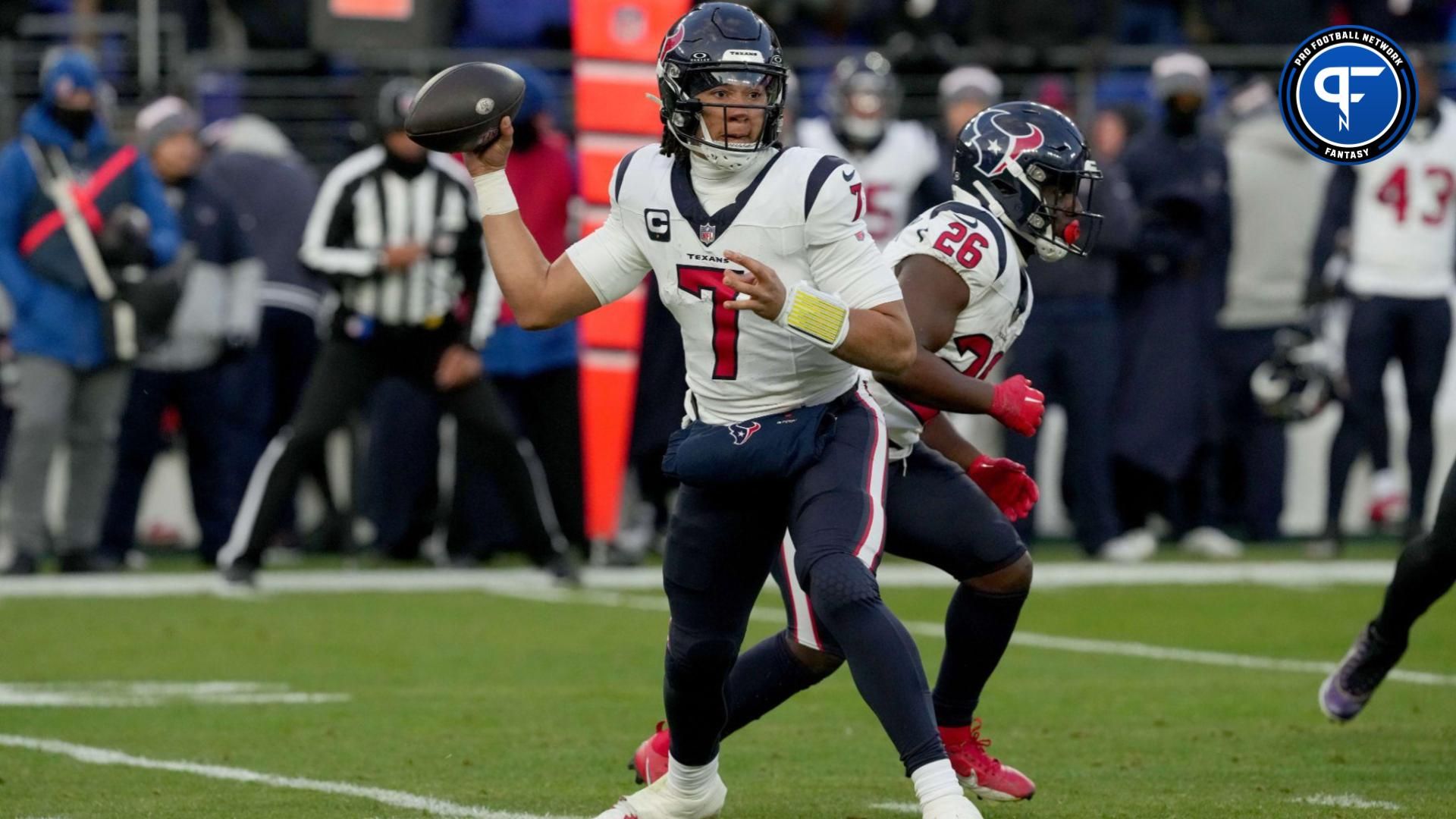 Houston Texans quarterback C.J. Stroud (7) throws a pass as running back Devin Singletary (26) blocks against the Baltimore Ravens during the first quarter of a 2024 AFC divisional round game at M&T Bank Stadium.