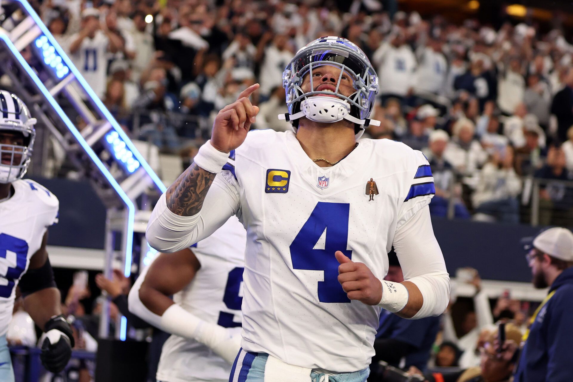 Jan 14, 2024; Arlington, Texas, USA; Dallas Cowboys quarterback Dak Prescott (4) takes the field against the Green Bay Packers for the 2024 NFC wild card game at AT&T Stadium. Mandatory Credit: Tim Heitman-USA TODAY Sports