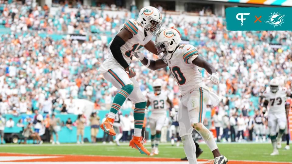 Miami Dolphins wide receiver Jaylen Waddle (17) celebrates his touchdown against the New England Patriots with wide receiver Tyreek Hill (10) during the second half at Hard Rock Stadium. Mandatory Credit: Jasen Vinlove-USA TODAY Sports