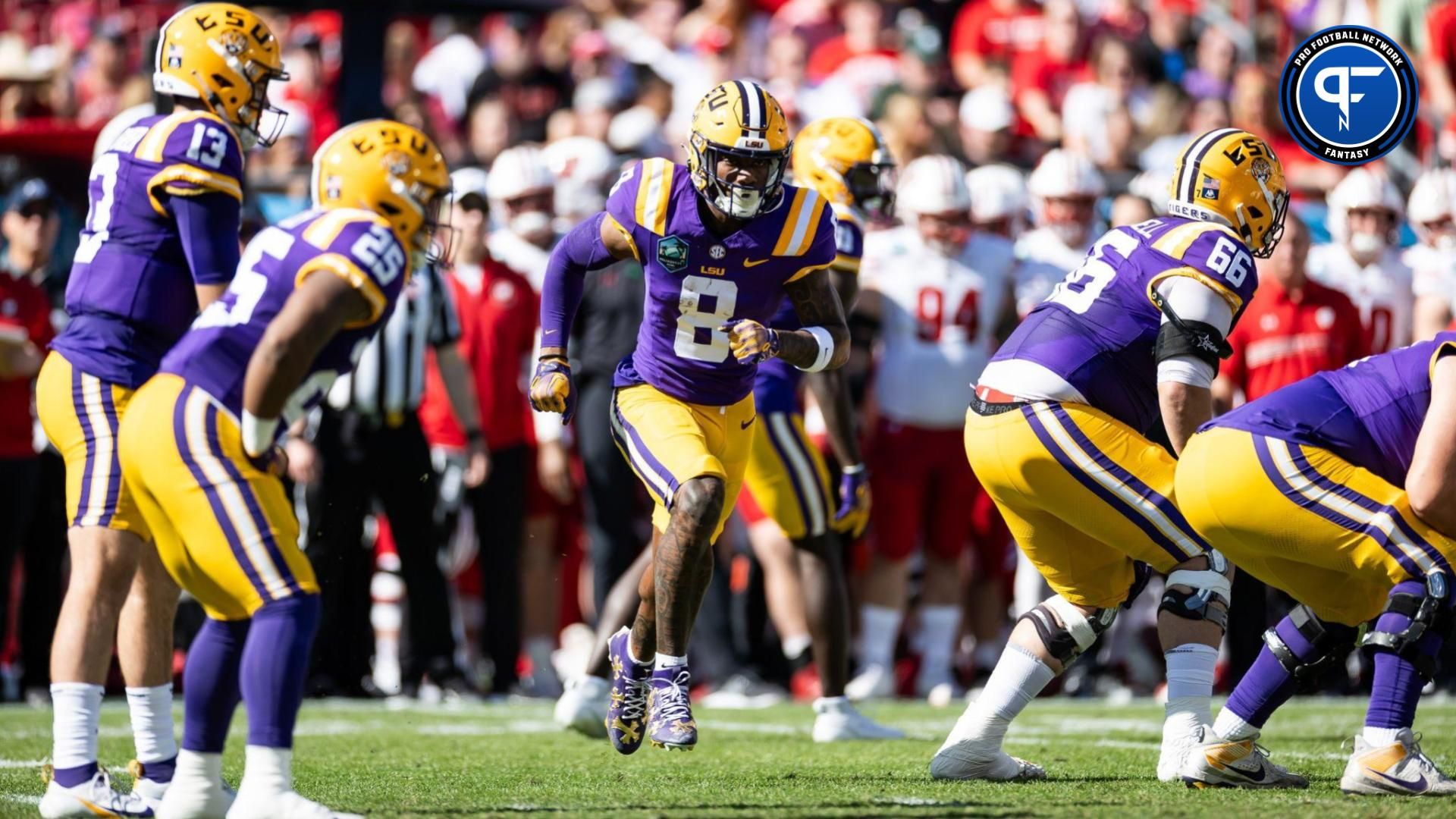 LSU Tigers wide receiver Malik Nabers (8) runs before the snap during the first half against the Wisconsin Badgers at Raymond James Stadium.