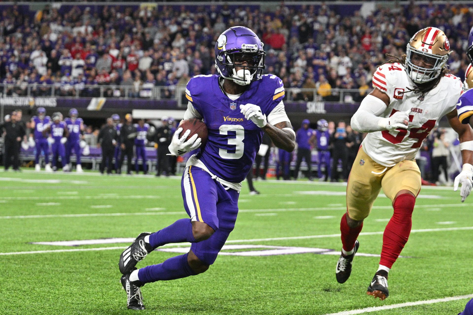 Oct 23, 2023; Minneapolis, Minnesota, USA; Minnesota Vikings wide receiver Jordan Addison (3) runs with the ball as San Francisco 49ers linebacker Fred Warner (54) pursues during the game at U.S. Bank Stadium. Mandatory Credit: Jeffrey Becker-USA TODAY Sports