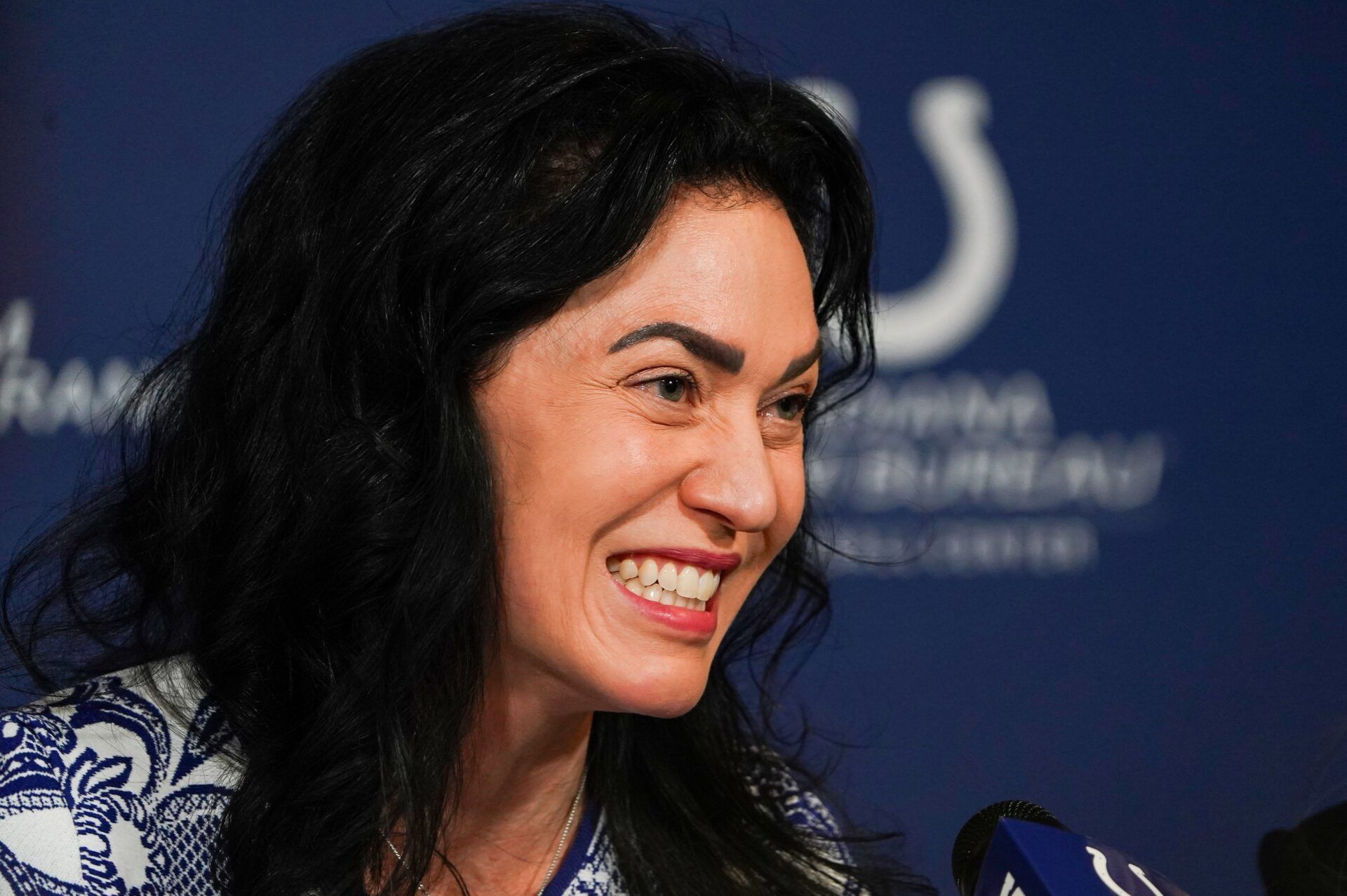 Carlie Irsay-Gordon smiles while answering questions Tuesday, June 10, 2025, during a press conference at the Indiana Farm Bureau Football Center in Indianapolis.