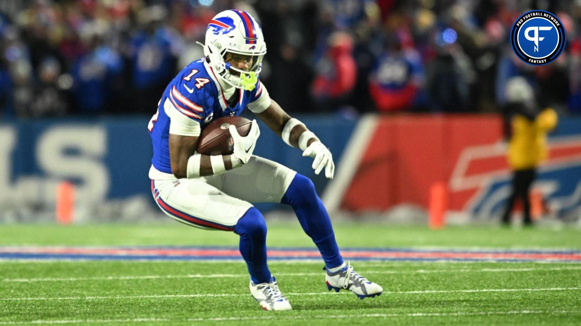 Buffalo Bills wide receiver Stefon Diggs (14) runs the ball in the second half against the Pittsburgh Steelers in a 2024 AFC wild card game at Highmark Stadium.