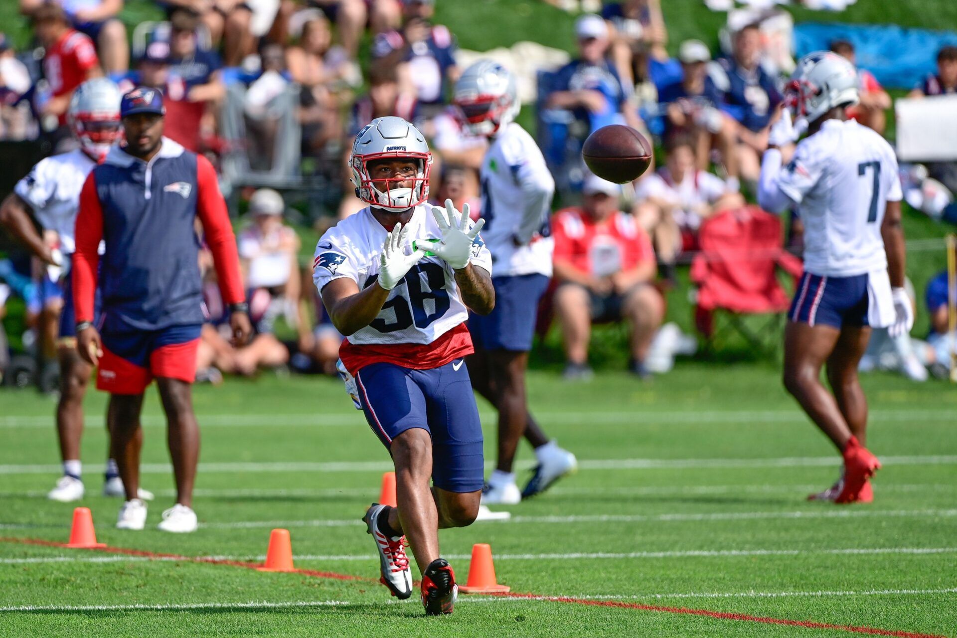 New England Patriots wide receiver Kayshon Boutte (58) makes a catch during training camp at Gillette Stadium.