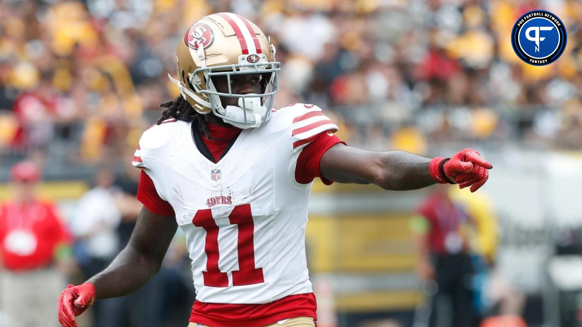 San Francisco 49ers wide receiver Brandon Aiyuk (11) gestures at the line of scrimmage against the Pittsburgh Steelers during the first quarter at Acrisure Stadium. Mandatory Credit: Charles