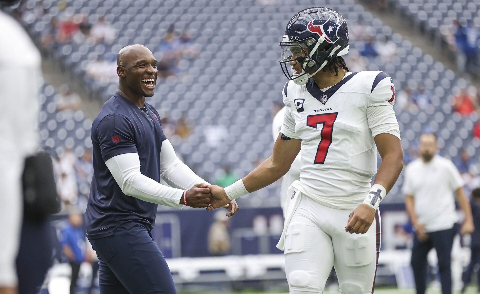 Houston Texans head coach DeMeco Ryans shakes hands with quarterback C.J. Stroud (7) before the game against the Indianapolis Colts at NRG Stadium. Mandatory Credit: Troy Taormina-USA TODAY Sports