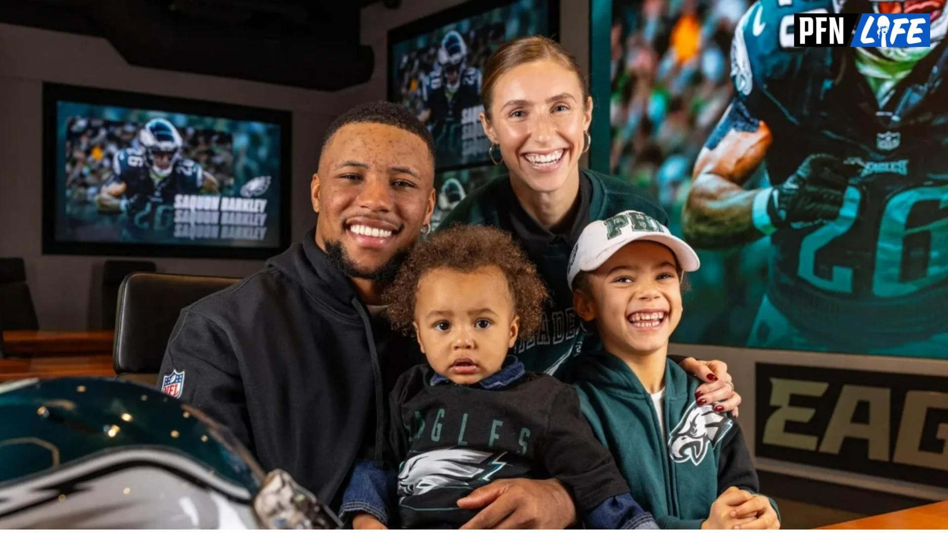 Saquon Barkley celebrates with his family after joining the Philadelphia Eagles.