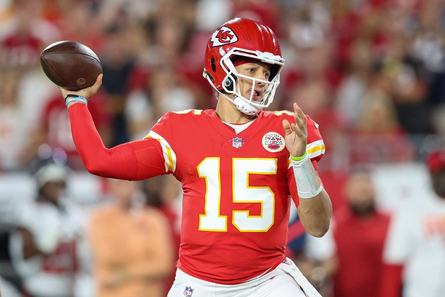 Kansas City Chiefs quarterback Patrick Mahomes (15) throws a touchdown to tight end Travis Kelce (87) (not pictured) against the Tampa Bay Buccaneers in the first quarter at Raymond James Stadium. Is Mahomes the highest-rated AFC Player on PFN's NFL Top 100 list? Mandatory Credit: Nathan Ray Seebeck-USA TODAY Sports