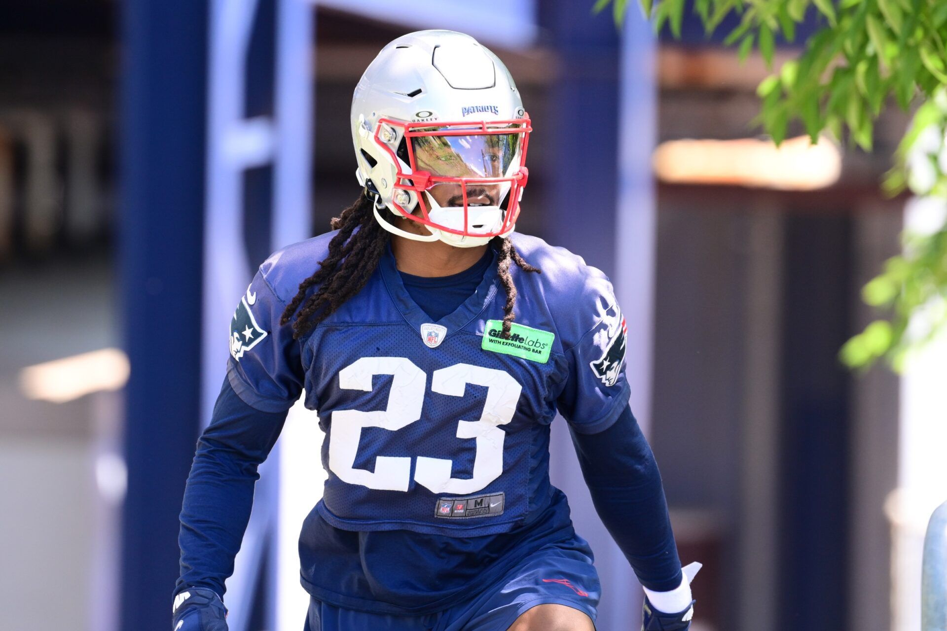 New England Patriots safety Kyle Dugger (23) walks to the practice fields for minicamp at Gillette Stadium.