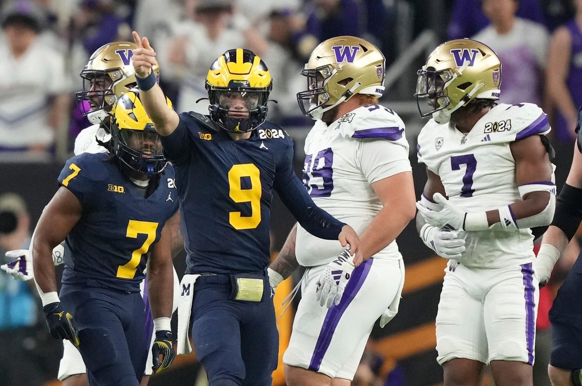 Michigan quarterback J.J. McCarthy points down the field during the second half of the College Football Playoff national championship game against Washington at NRG Stadium in Houston, Texas on Monday, Jan. 8, 2024 and is now a possible NFL Offensive Rookie of the Year candidate.