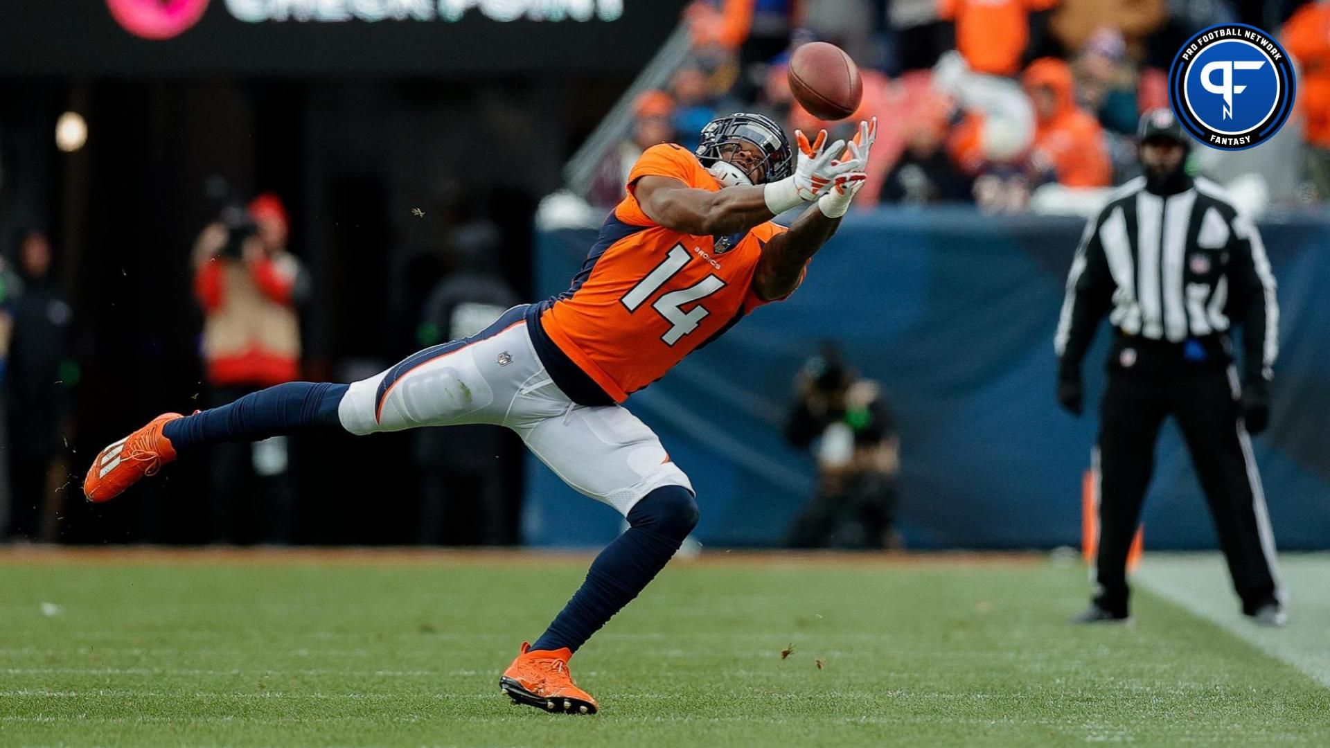 Denver Broncos wide receiver Courtland Sutton (14) is unable to pull in a pass after being fouled on a pass interference in the fourth quarter against the Kansas City Chiefs at Empower Field at Mile High.