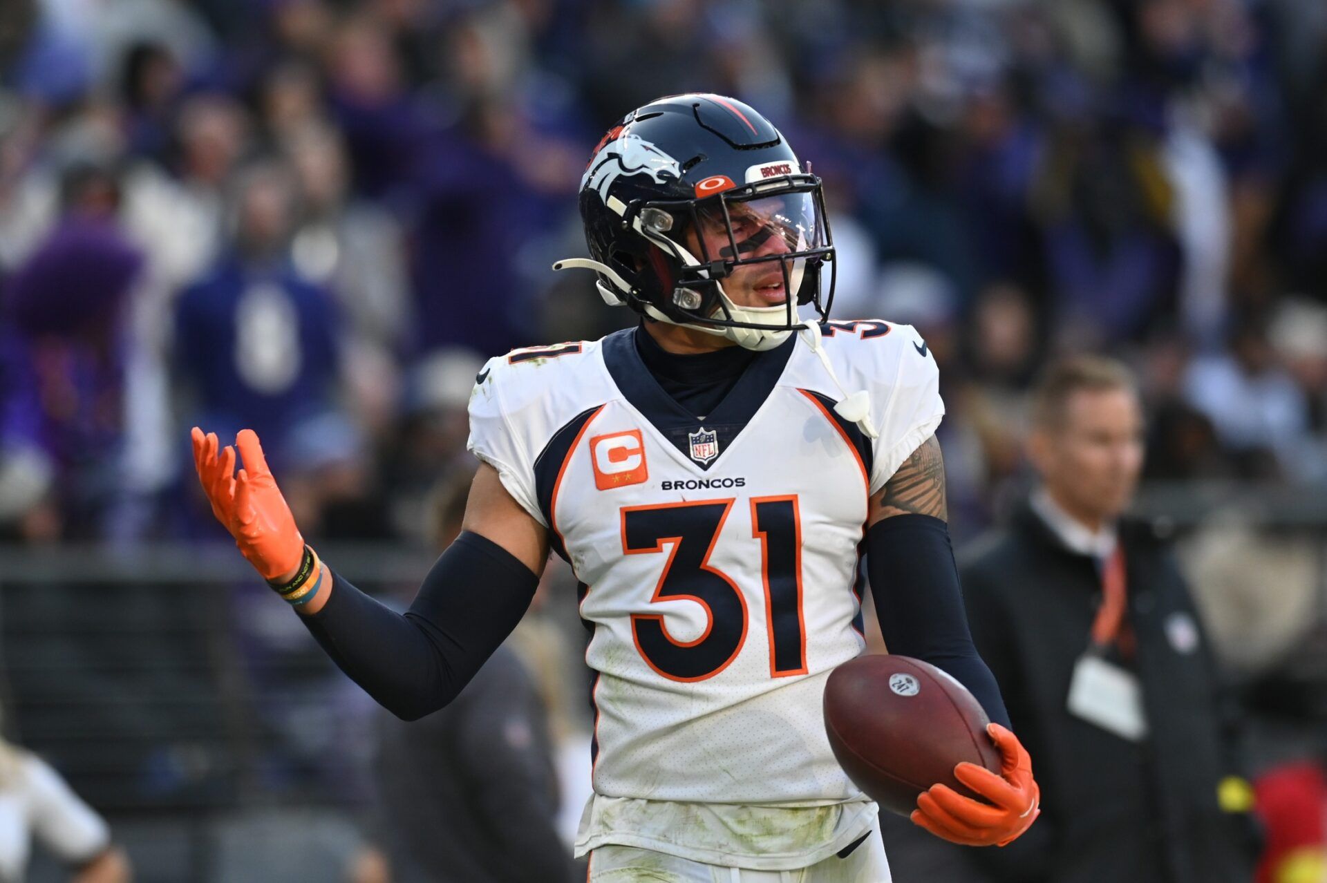 Denver Broncos safety Justin Simmons (31) after intercepting a pass in the end zone during the second half against the Baltimore Ravens at M&T Bank Stadium. Mandatory Credit: Tommy Gilligan-USA TODAY Sports