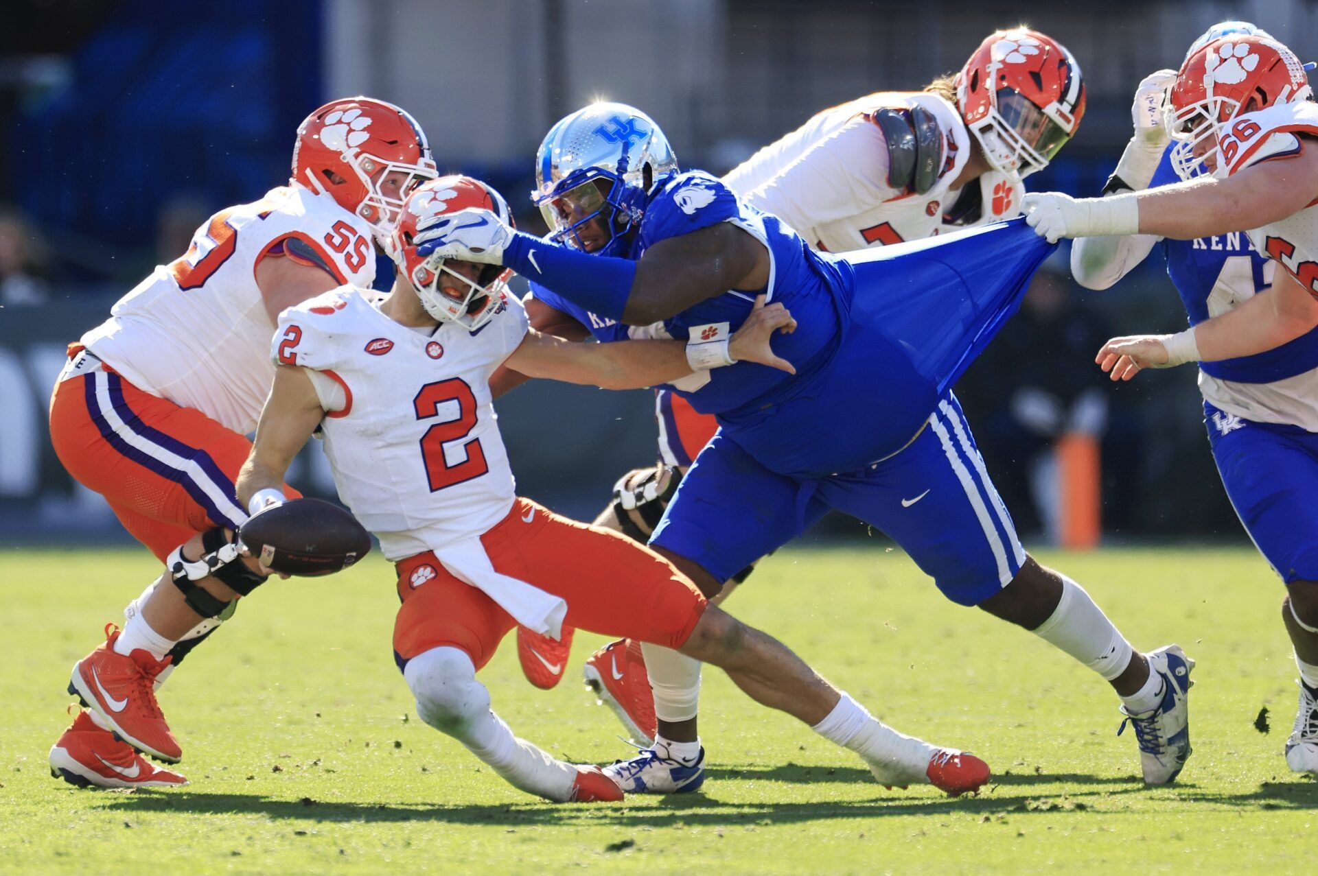 Clemson Tigers quarterback Cade Klubnik (2) is sacked by Kentucky Wildcats defensive lineman Deone Walker (0) during the third quarter of an NCAA football matchup in the TaxSlayer Gator Bowl Friday, Dec. 29, 2023 at EverBank Stadium in Jacksonville, Fla. The Clemson Tigers edged the Kentucky Wildcats 38-35. Walker lands in Miami in our latest Dolphins mock draft. [Corey Perrine/Florida Times-Union]