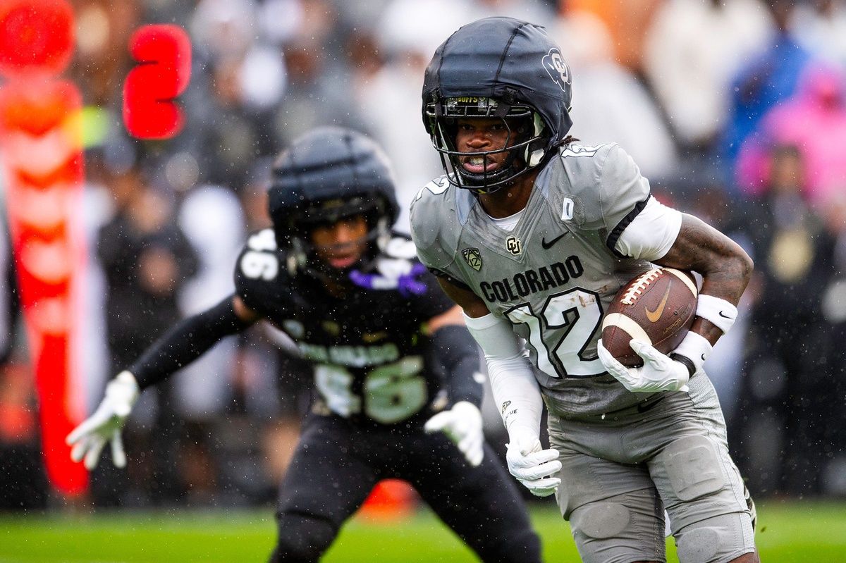 Colorado's Travis Hunter runs the ball during a Colorado football spring game at Folsom Field in Boulder, Colo., on Saturday, April 27, 2024. Hunter lands in New England in our latest Patriots mock draft.