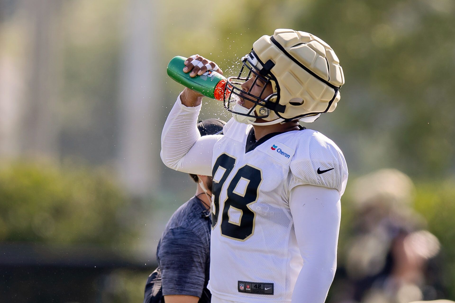 Which NFC South cut candidates need a strong training camp to avoid being let go after slow starts to their young careers?