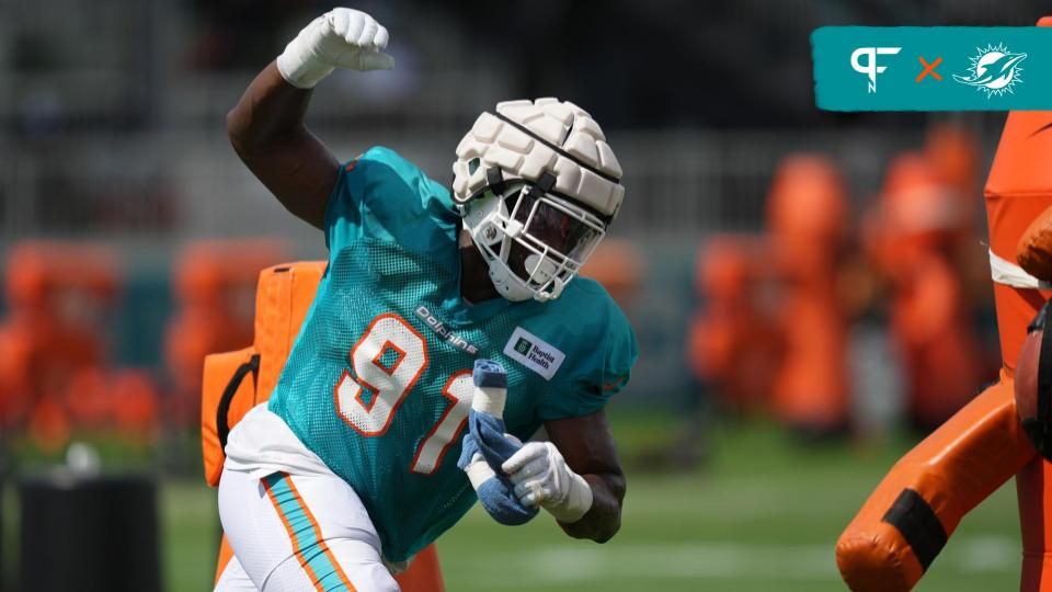 Miami Dolphins defensive end Emmanuel Ogbah (91) runs a drill during training camp at Baptist Health Training Complex.