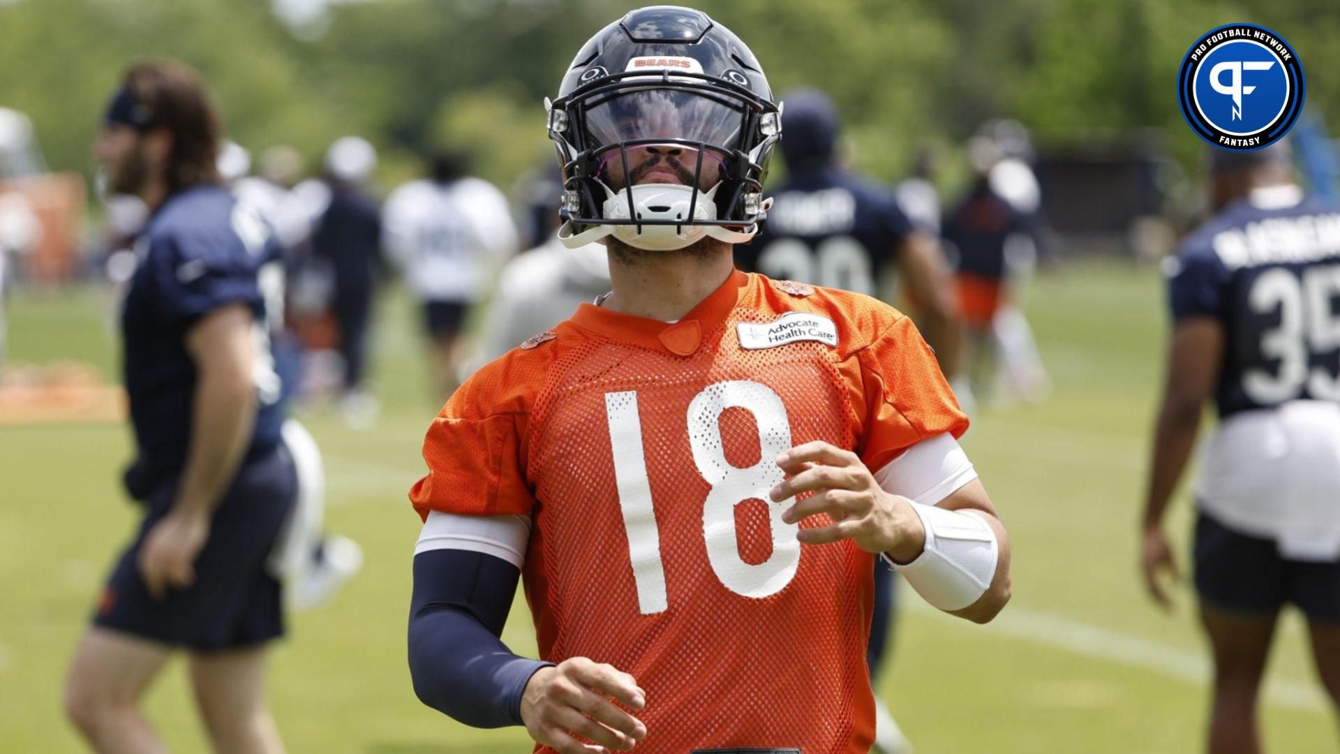 Chicago Bears quarterback Caleb Williams (18) warms up during the team's minicamp at Halas Hall.