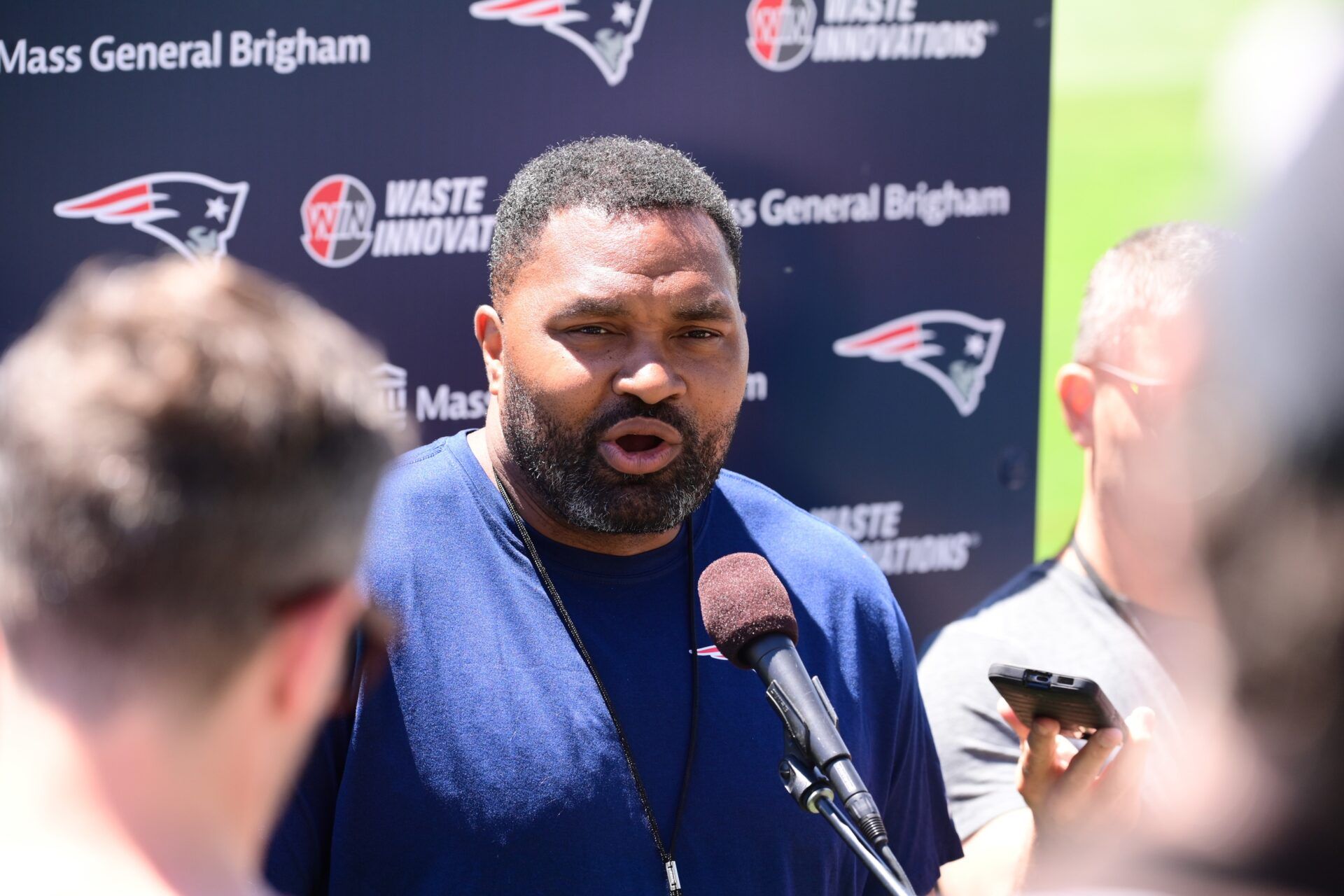 New England Patriots head coach Jerod Mayo speaks at a press conference.