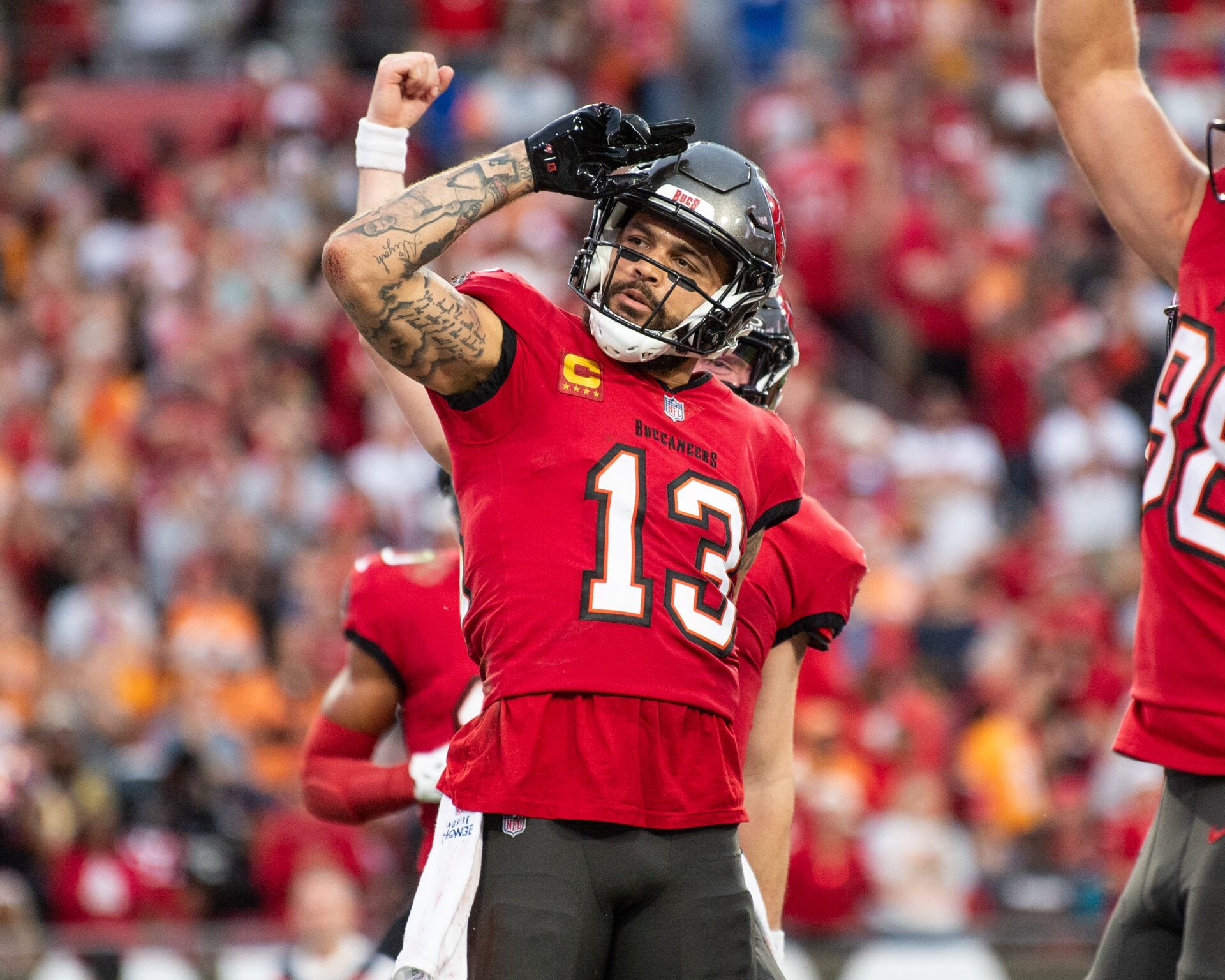 Dec 24, 2023; Tampa, Florida, USA; Tampa Bay Buccaneers wide receiver Mike Evans (13) celebrates the touchdown against the Jacksonville Jaguars in the second quarter at Raymond James Stadium. Mandatory Credit: Jeremy Reper-USA TODAY Sports