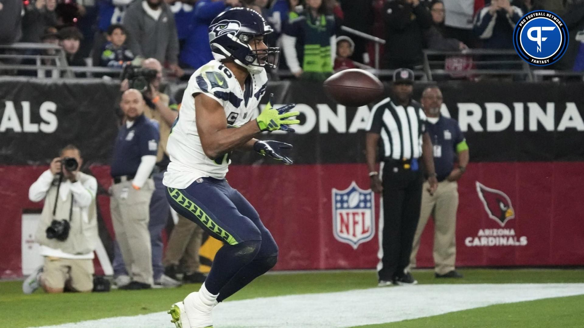Seattle Seahawks wide receiver Tyler Lockett (16) catches a two-point conversion against the Arizona Cardinals to give his team a 21-20 lead in the fourth quarter at State Farm Stadium in Glendale on Jan. 7, 2024.