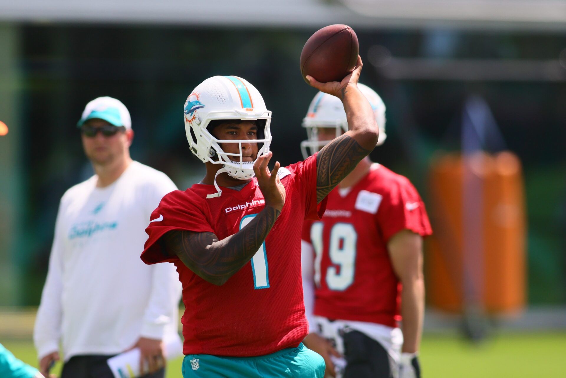 Miami Dolphins quarterback Tua Tagovailoa (1) throws the football during mandatory minicamp at Baptist Health Training Complex. Mandatory