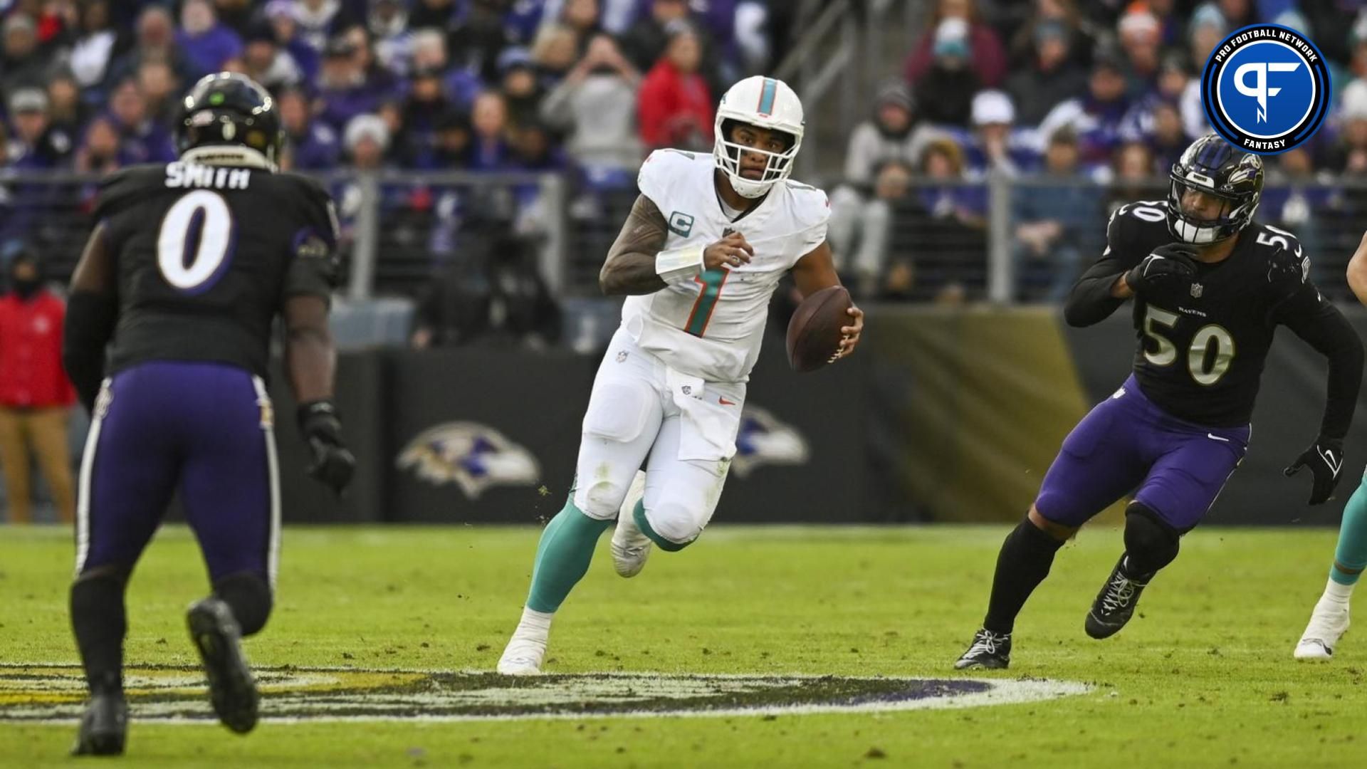 Miami Dolphins quarterback Tua Tagovailoa (1) rushes during the second half against the Baltimore Ravens at M&T Bank Stadium.Baltimore Ravens defeated Miami Dolphins 56-19.