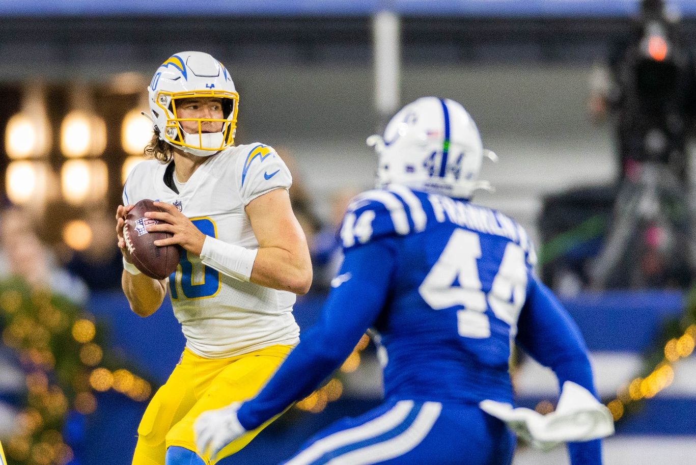 Los Angeles Chargers quarterback Justin Herbert (10) drops back to pass the ball in the first half against the Indianapolis Colts at Lucas Oil Stadium. Herbert and the Chargers have an easy NFL strength of schedule for the upcoming season. Mandatory Credit: Trevor Ruszkowski-USA TODAY Sports