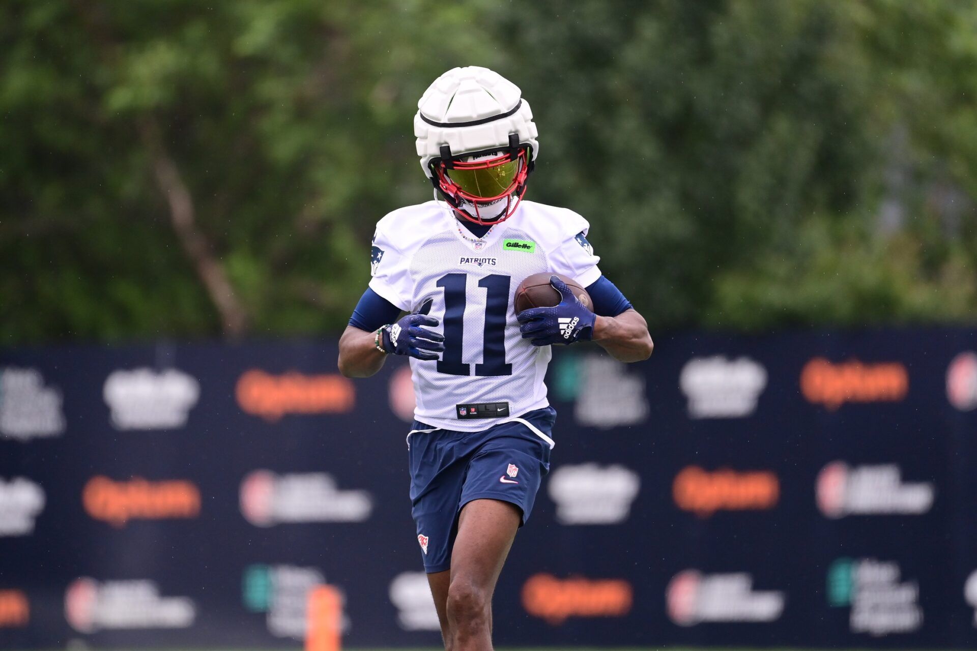 New England Patriots wide receiver Tyquan Thornton (11) runs after making a catch during training camp at Gillette Stadium. Mandatory Credit: Eric Canha-USA TODAY Sports