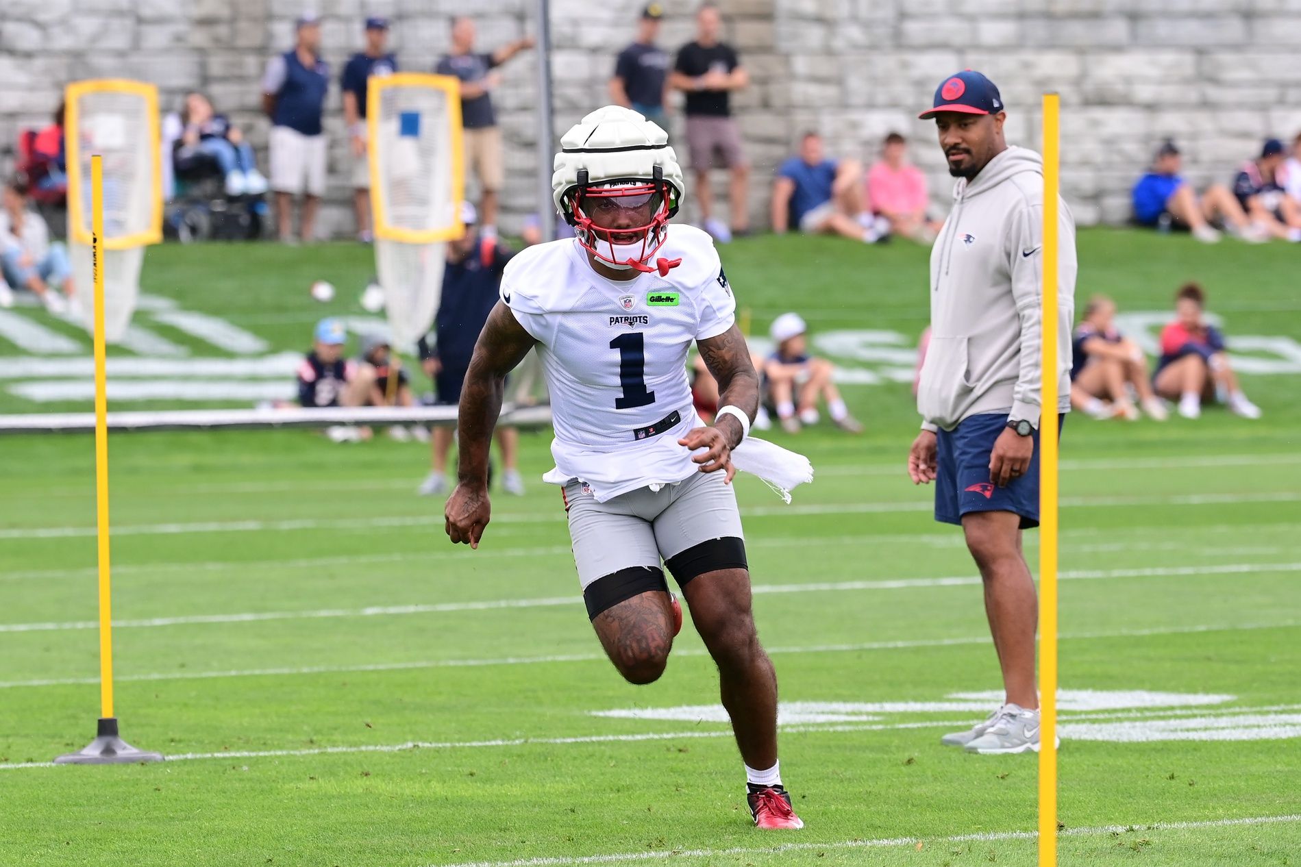 New England Patriots wide receiver Ja'Lynn Polk (1) runs through a drill during training camp at Gillette Stadium. Mandatory Credit: Eric Canha-USA TODAY Sports