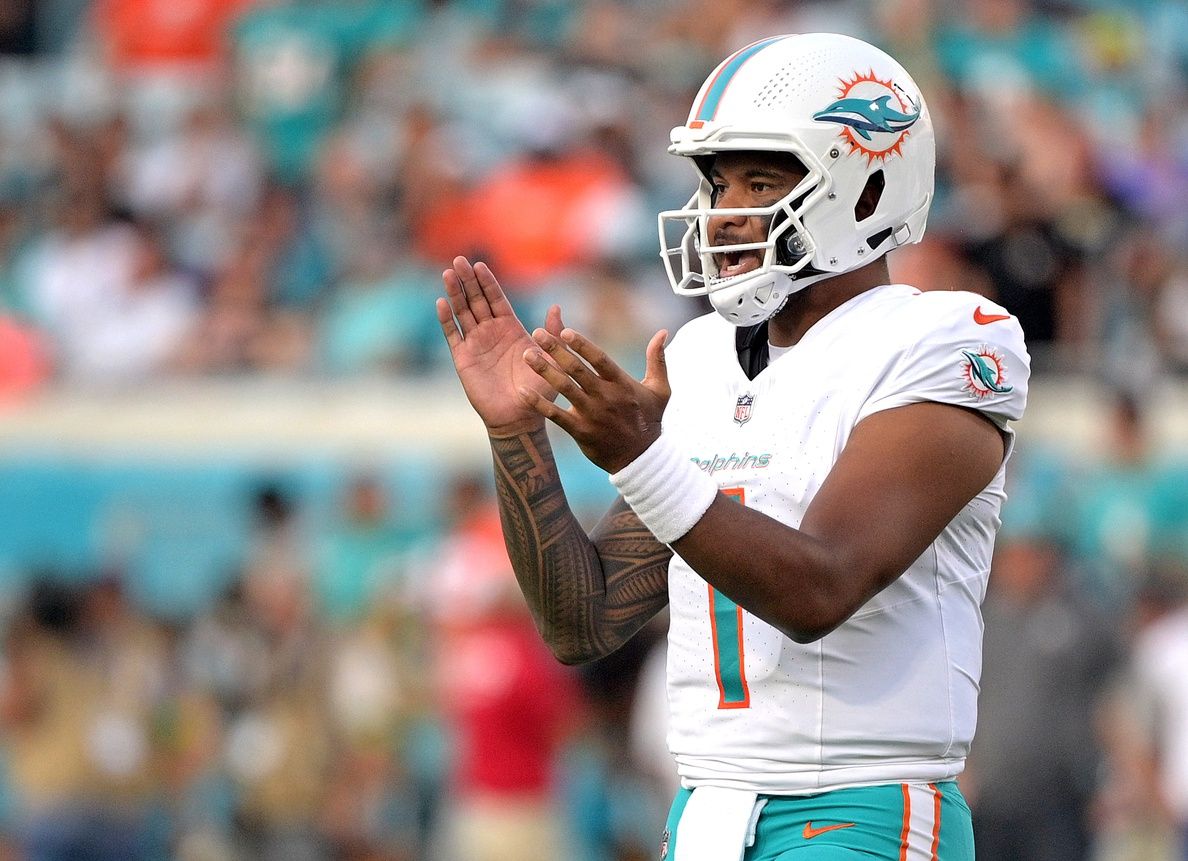 Miami Dolphins quarterback Tua Tagovailoa (1) celebrates a first down during the game against the Jacksonville Jaguars at EverBank Stadium. Mandatory Credit: Melina Myers-USA TODAY Sports