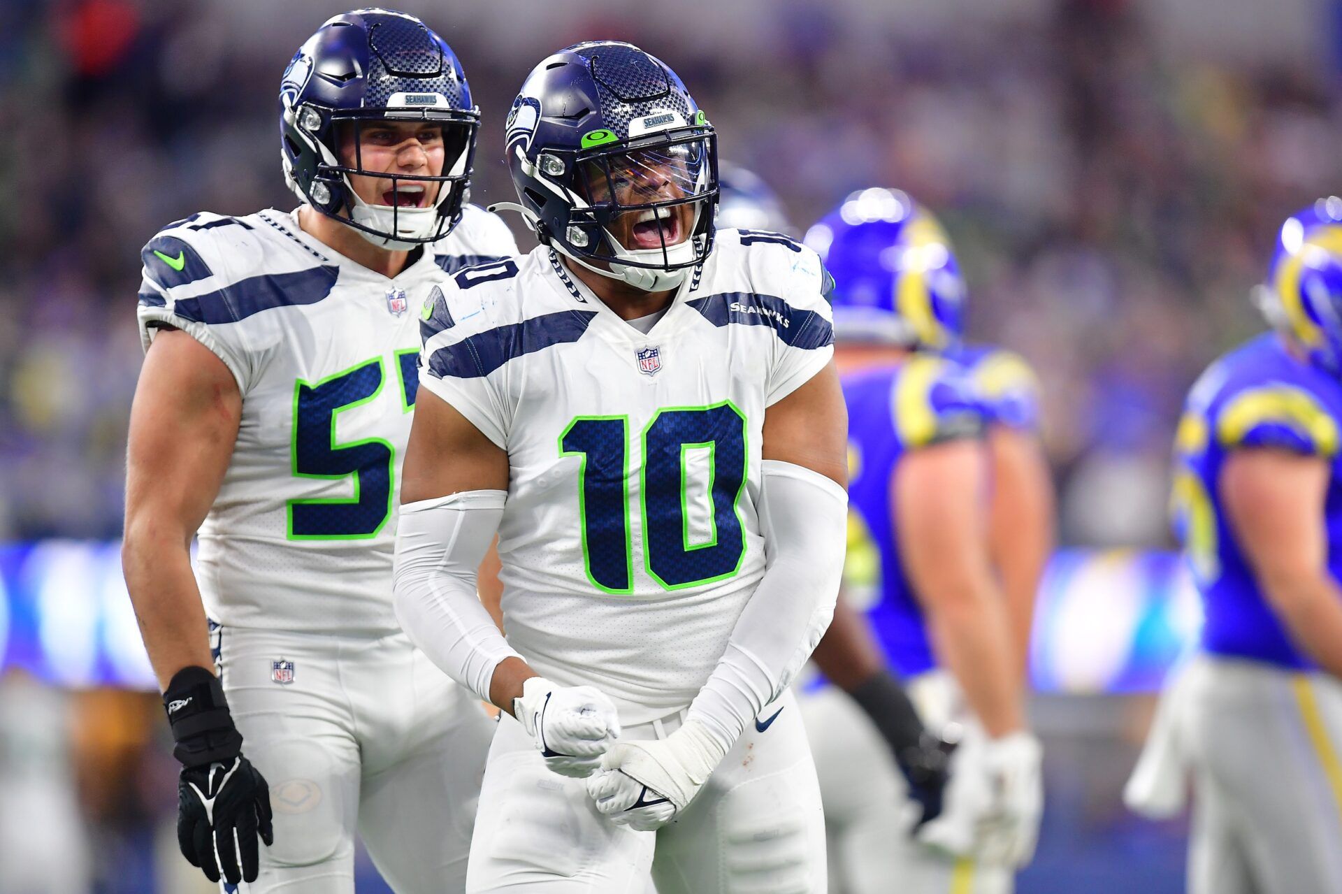 Seattle Seahawks linebacker Uchenna Nwosu (10) and linebacker Cody Barton (57) react against the Los Angeles Rams during the second half at SoFi Stadium. Mandatory Credit: Gary A. Vasquez-USA TODAY Sports