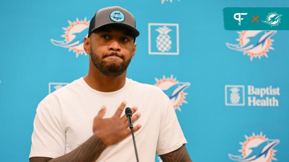 Miami Dolphins quarterback Tua Tagovailoa (1) reacts while talking to reporters during a press conference after training camp at Baptist Health Training Complex.