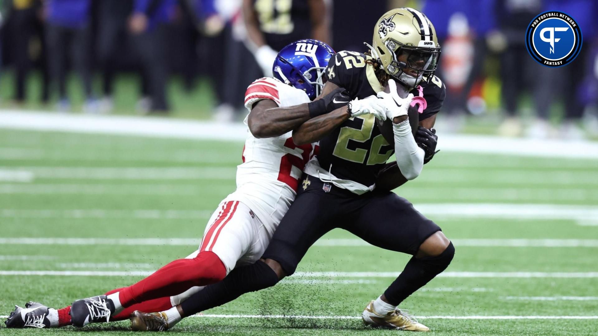 New Orleans Saints wide receiver Rashid Shaheed (22) is tackled during the second half against the New York Giants at Caesars Superdome.