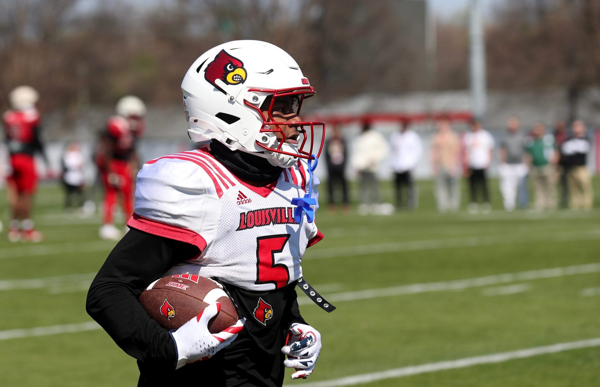 Louisville’s Caullin Lacy, #5, caught the ball during spring practice Friday afternoon. Mar. 29, 2024