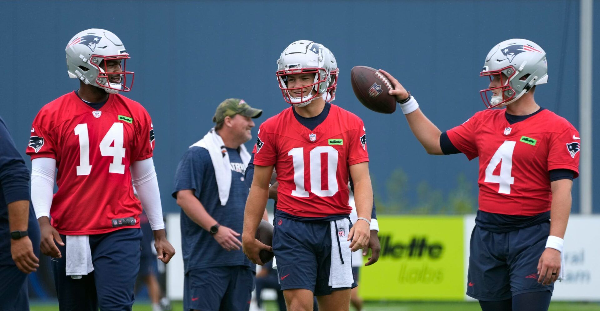 New England Patriots quarterbacks Jacoby Brissett, Drake Maye, and Bailey Zappe during first day of training camp Wednesday morning.