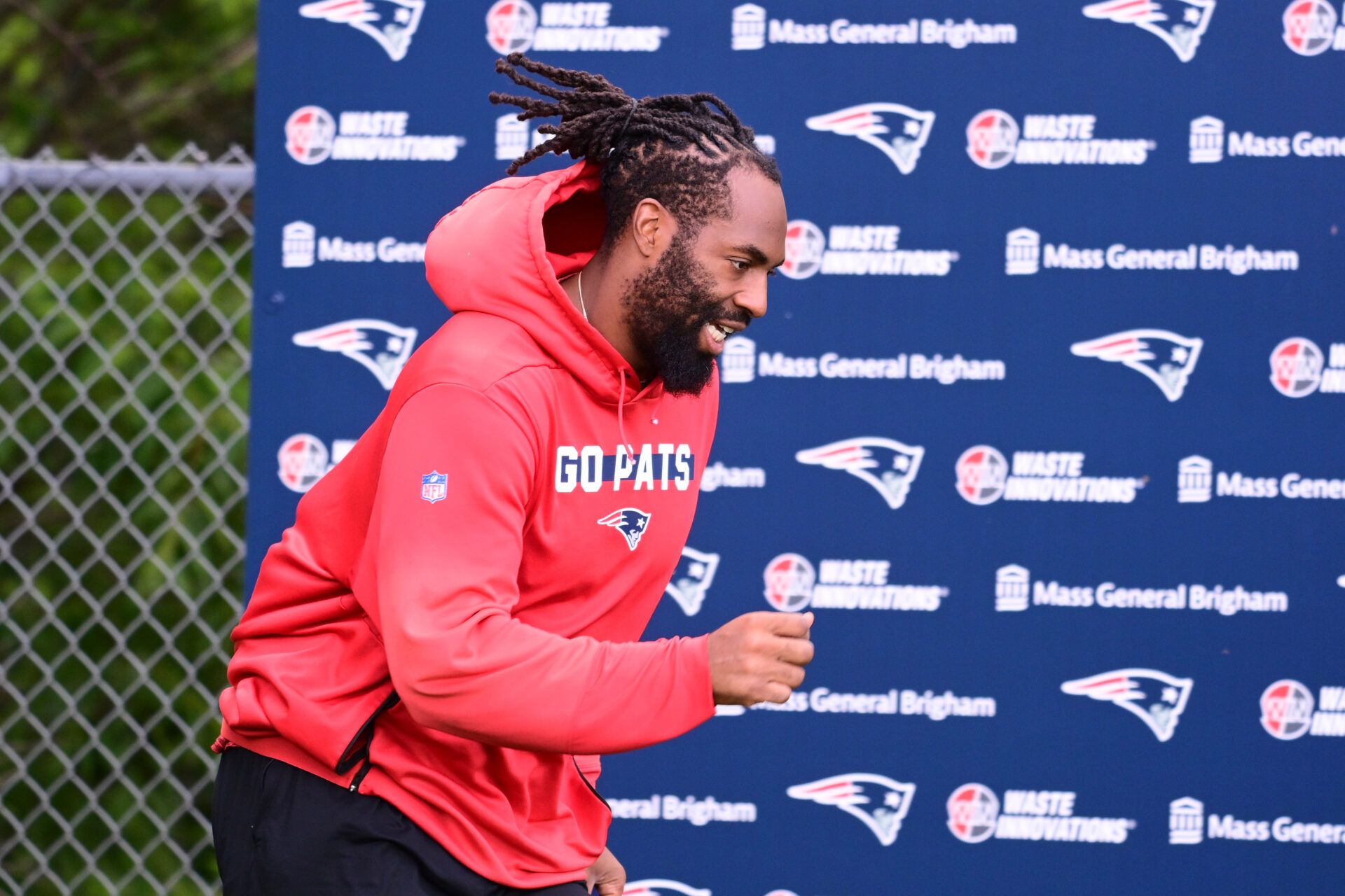 Jun 12, 2024; Foxborough, MA, USA; New England Patriots linebacker Matthew Judon (9) runs onto the practice field at minicamp at Gillette Stadium. Mandatory Credit: Eric Canha-USA TODAY Sports