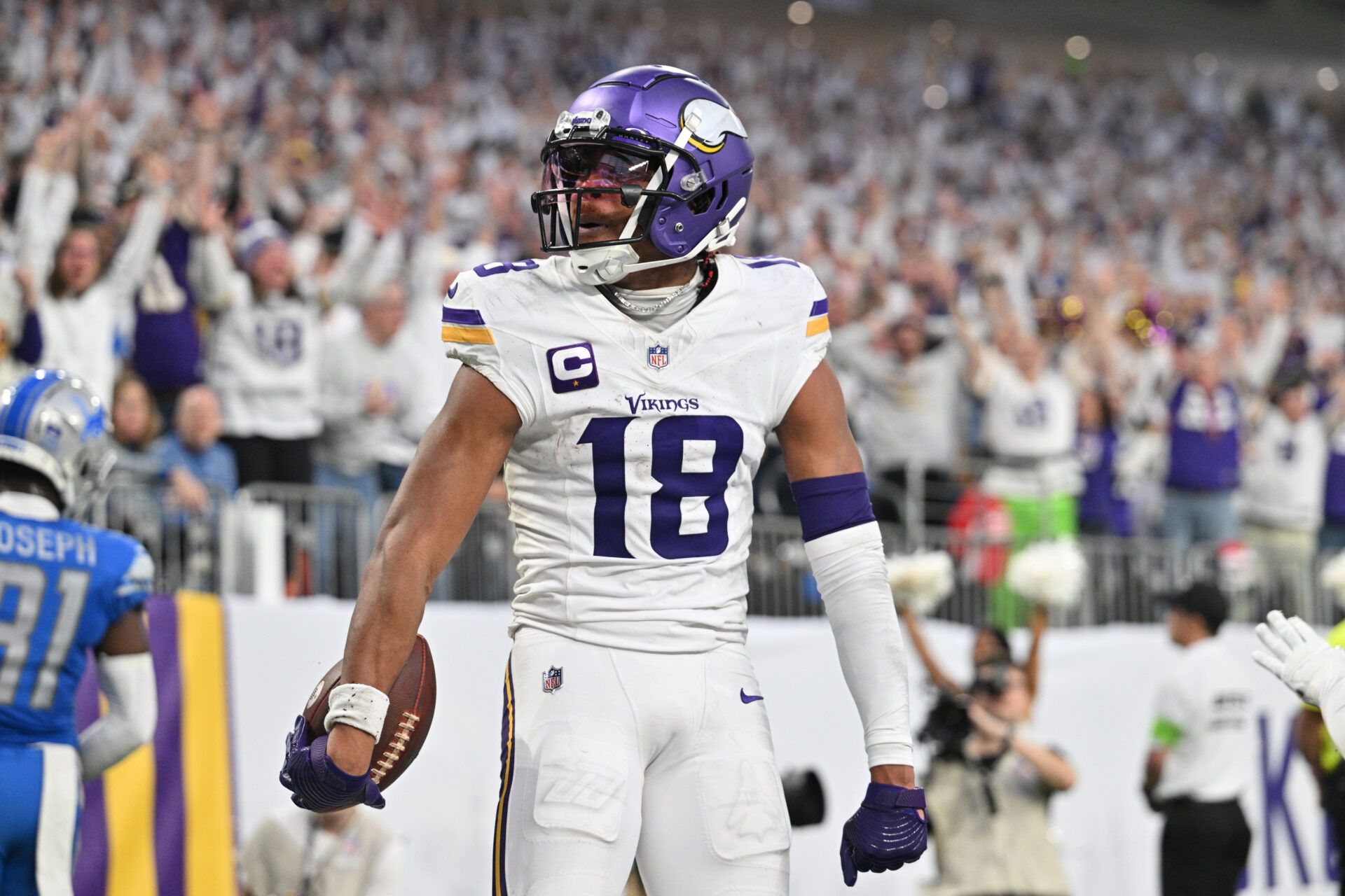 Dec 24, 2023; Minneapolis, Minnesota, USA; Minnesota Vikings wide receiver Justin Jefferson (18) reacts after scoring a touchdown during the second quarter against the Detroit Lions at U.S. Bank Stadium. Mandatory Credit: Jeffrey Becker-USA TODAY Sports