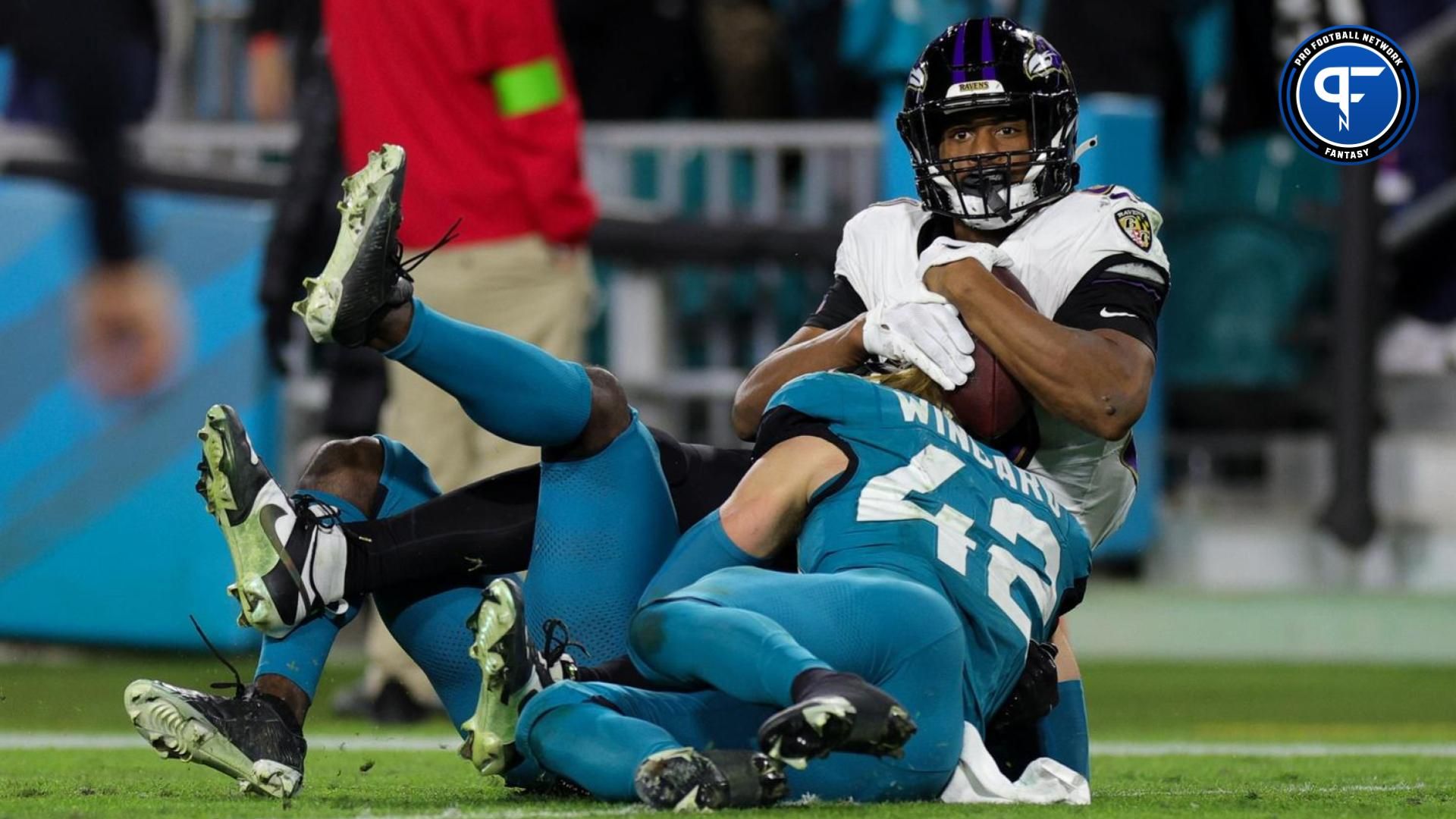 Baltimore Ravens tight end Isaiah Likely (80) makes a catch defended by Jacksonville Jaguars safety Andrew Wingard (42) in the third quarter at EverBank Stadium. Is he a fantasy football TE sleeper?